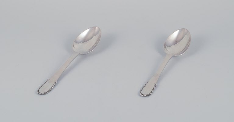 Georg Jensen. Two Beaded tablespoons in 830 silver.: Title:Georg Jensen. Two Beaded tablespoons in 830 silver. Description:Georg Jensen. Two Beaded tablespoons in 830 silver. Dated 1930. Perfect condition. Hallmarked 1915-1932. Dimensions: Length 20.2 c