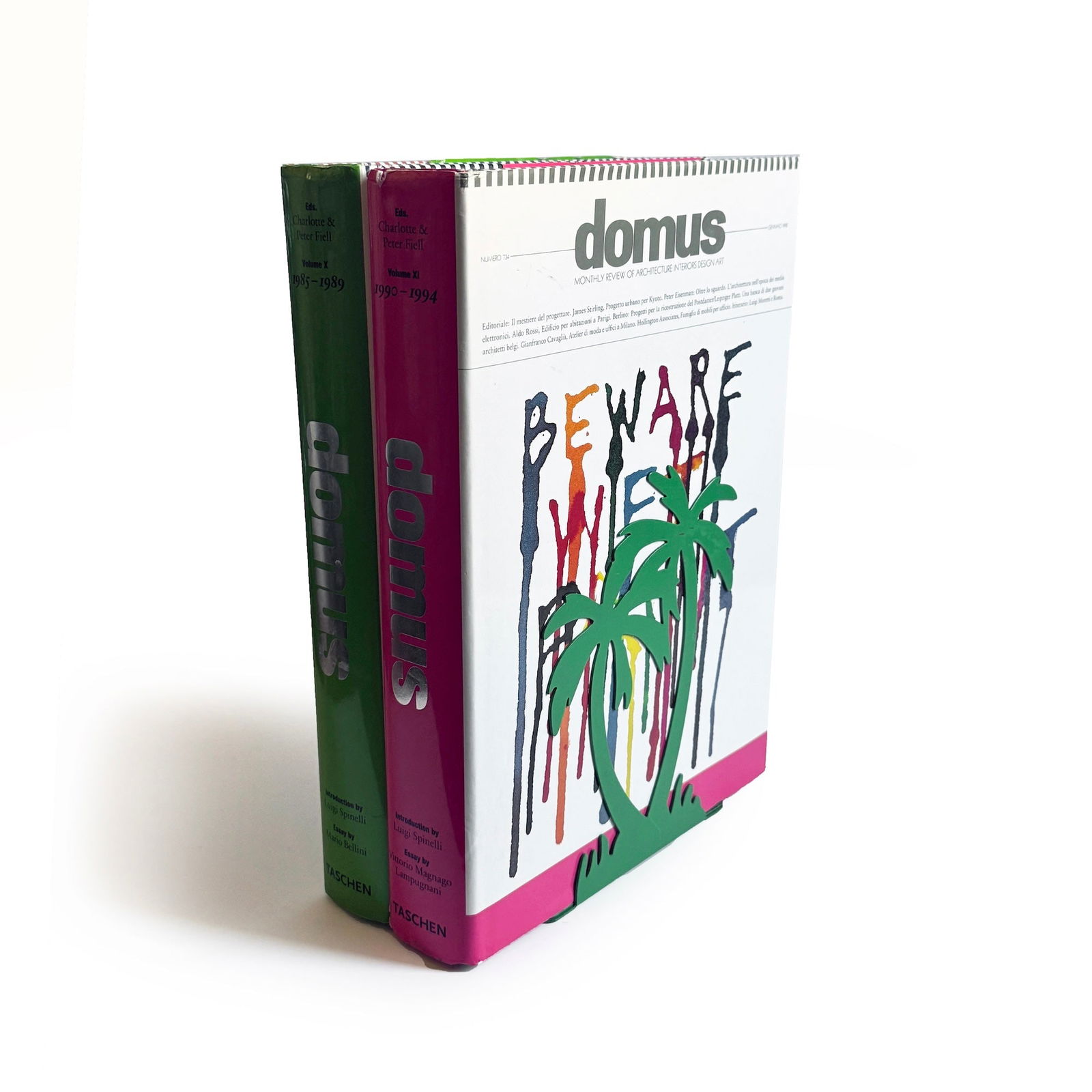 Pair of 1970s Palm Tree Bookends by Randall Schwartz for Moxie: A charming 1970s tropical-inspired pair of palm tree bookends designed by Randall Schwartz for Moxie. This pair features detailed palm tree silhouettes crafted from metal with a green enamel. In good