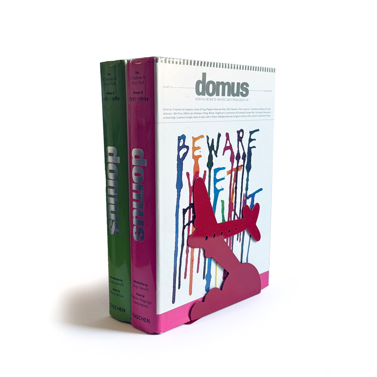 Pair of 1970s Red Airplane Bookends by Randall Schwartz for Moxie: A captivating 1970s aviation-inspired set of bookend that brings playful nostalgic charm and mid-century modern flair to any interior. Designed by Randall Schwartz for Moxie Brand Inc. in 1976, this s