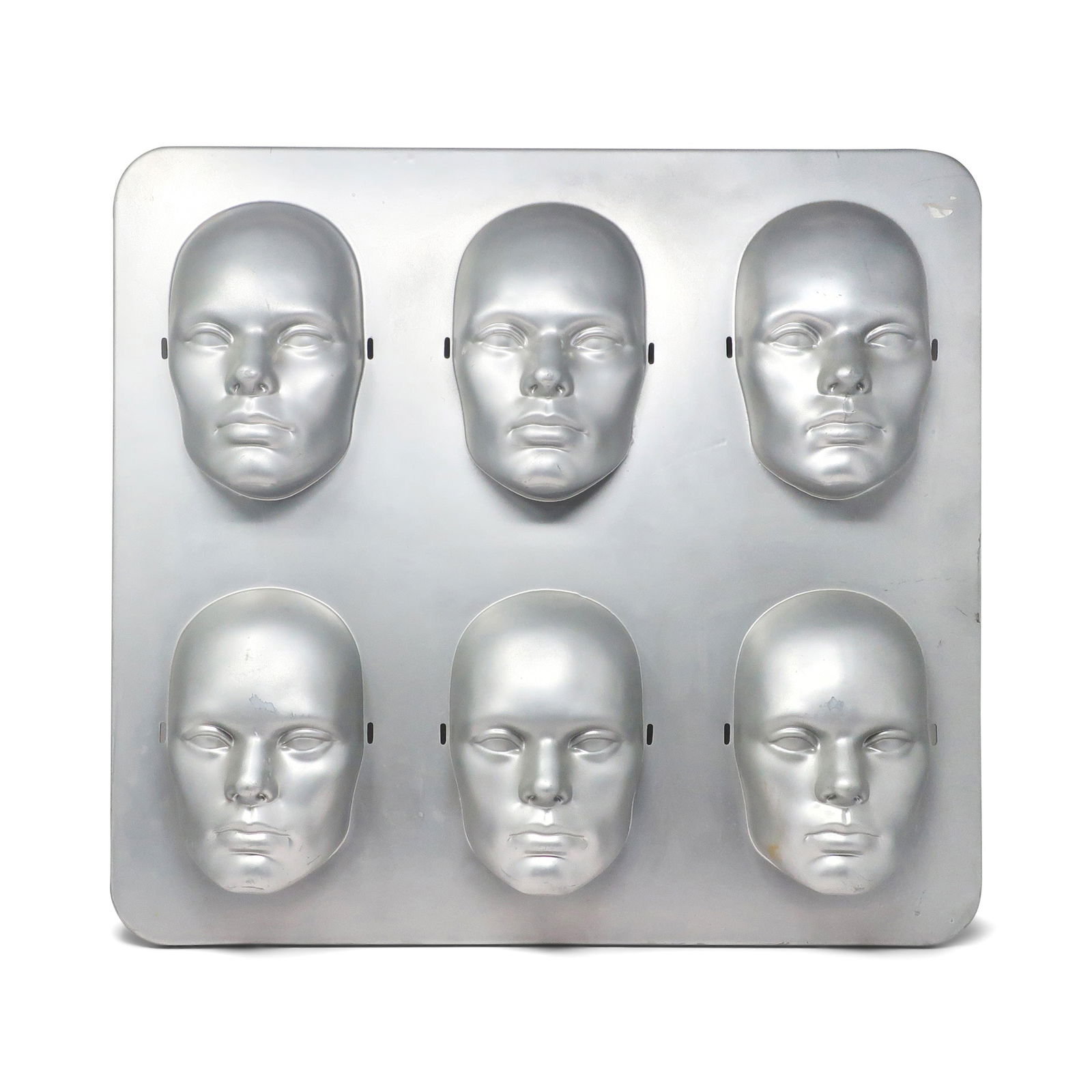 1980s Molded 3-D Eyeglass Display: A stunning 1980s molded plastic eyeglass or sunglasses display. It has six three-dimensional heads with small slits near their ears to insert the arms or temples of a pair of glasses, allowing for a d