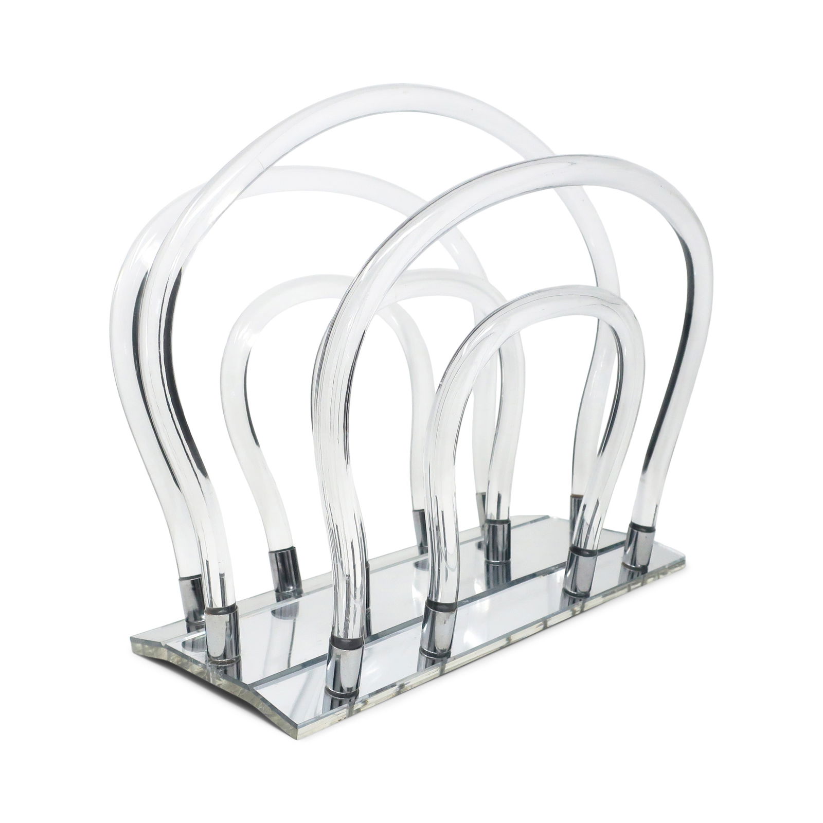 Vintage 1960s Lucite & Chrome Magazine Rack by Dorothy Thorpe: With an iconic and perfectly mid-century modern design attributed to Dorothy Thorpe, this magazine rack has a mirrored base, curved tubular lucite rods to hold in the magazines, and chrome accents con