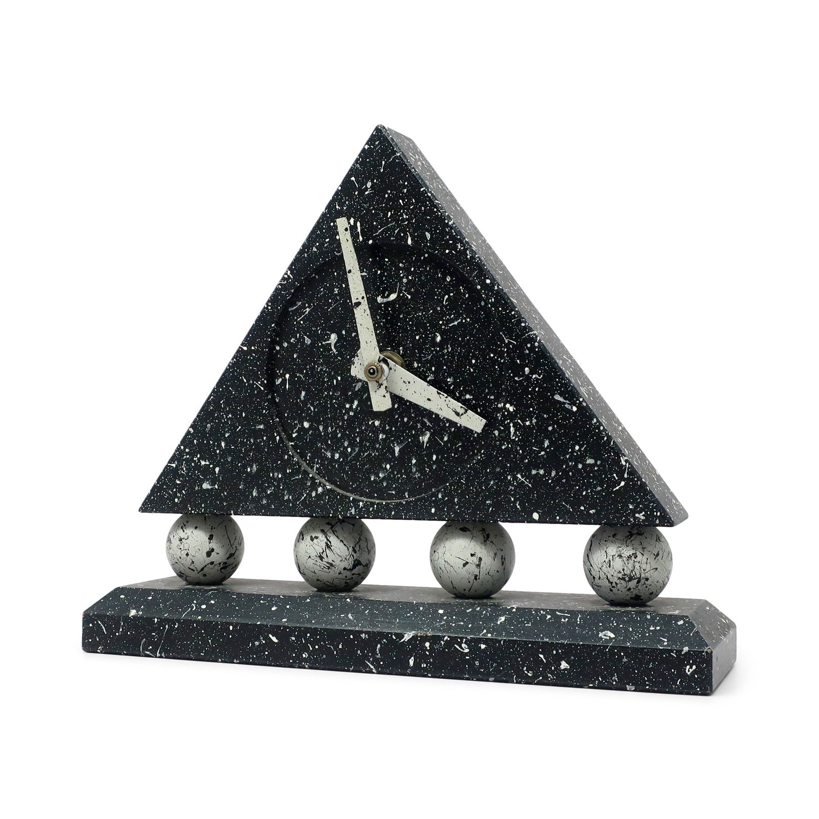 1980s Triangular Black Splatter Paint Desk Clock: A stunning postmodern desk clock with dark gray rectangular base, round light gray supports, and dark gray triangular body with white hands. The bold colors were then splattered with contrasting paint