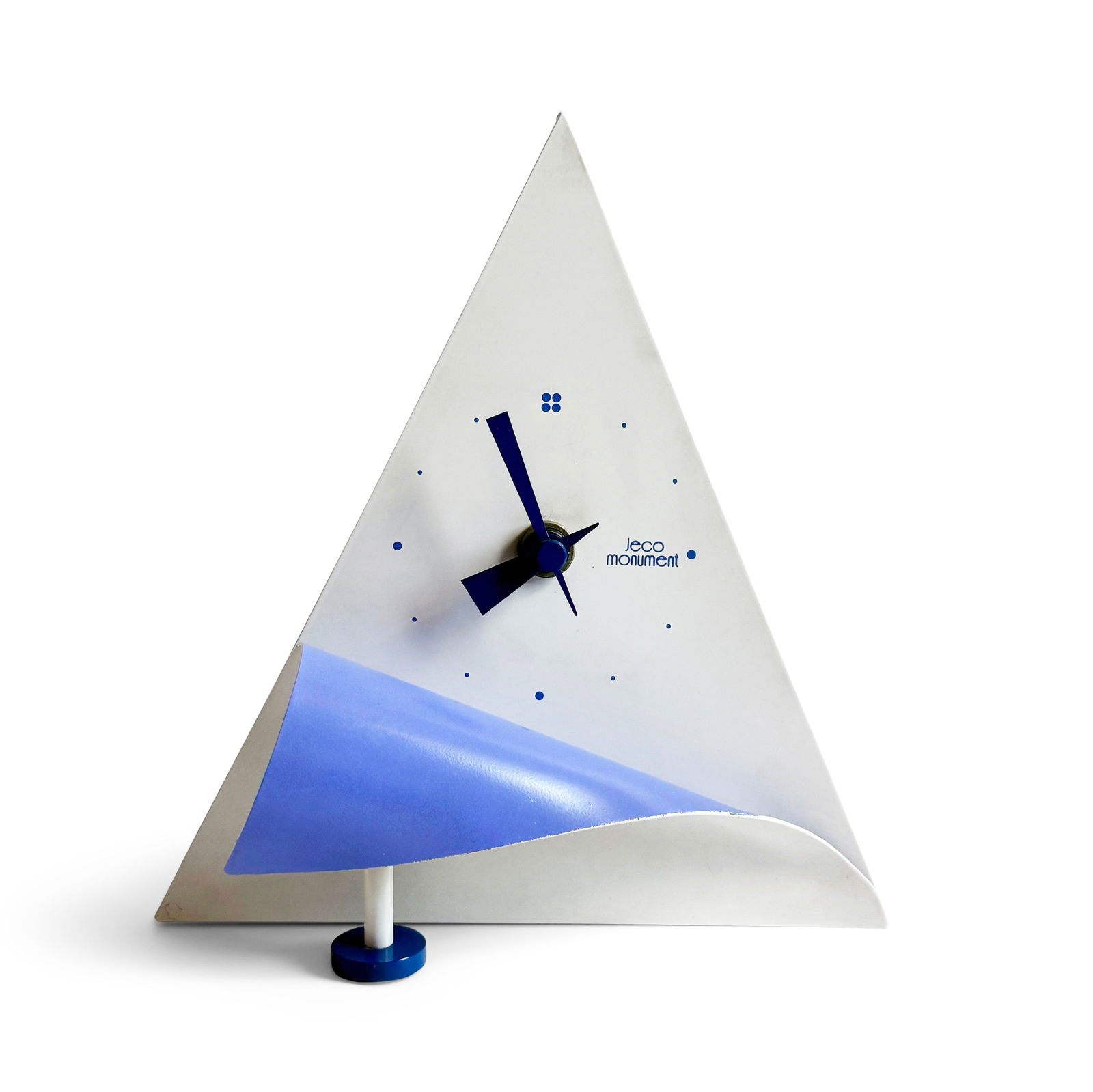 1980s Postmodern Triangular Desk Clock by Jeco: A playful 1980s postmodern timepiece, this exceptional Jeco desk clock showcases the bold geometric language that defined the Memphis design movement. Featuring a striking triangular form with an inge