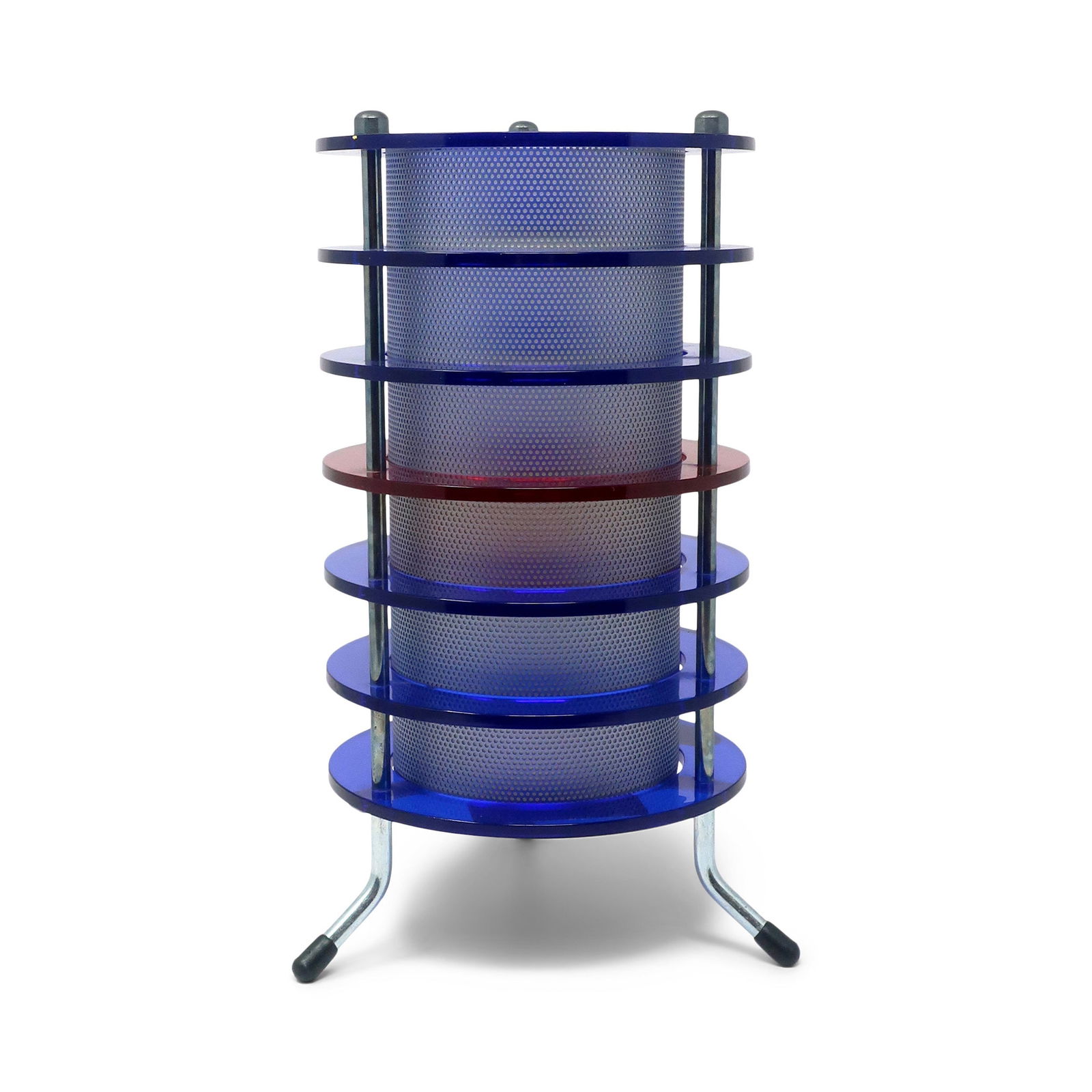 1990s Multicolored Lucite and Chrome Time Tunnel Lamp: A fantastic cylindrical table lamp with blue and red lucite rings, a mesh interior, and a chrome frame that gives perfect 1990s vibes! In very good vintage condition with wear consistent with age and