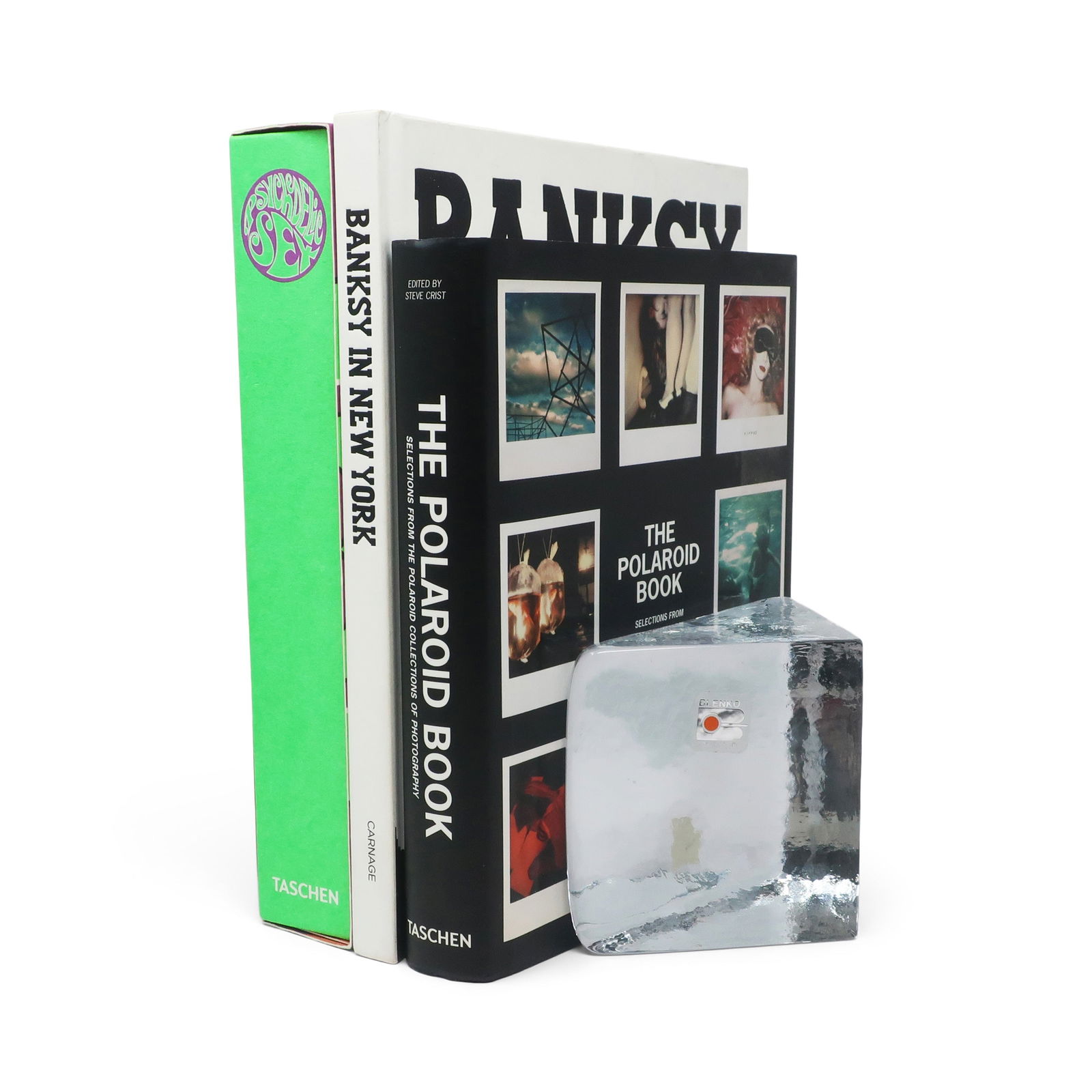 Vintage Triangular Cast Glass Bookends by Blenko: An awesome pair of heavy mid-century modern cast glass triangle shaped bookends by Blenko. Two sides are polished smooth and the other three sides are textured. In very good vintage condition with wea