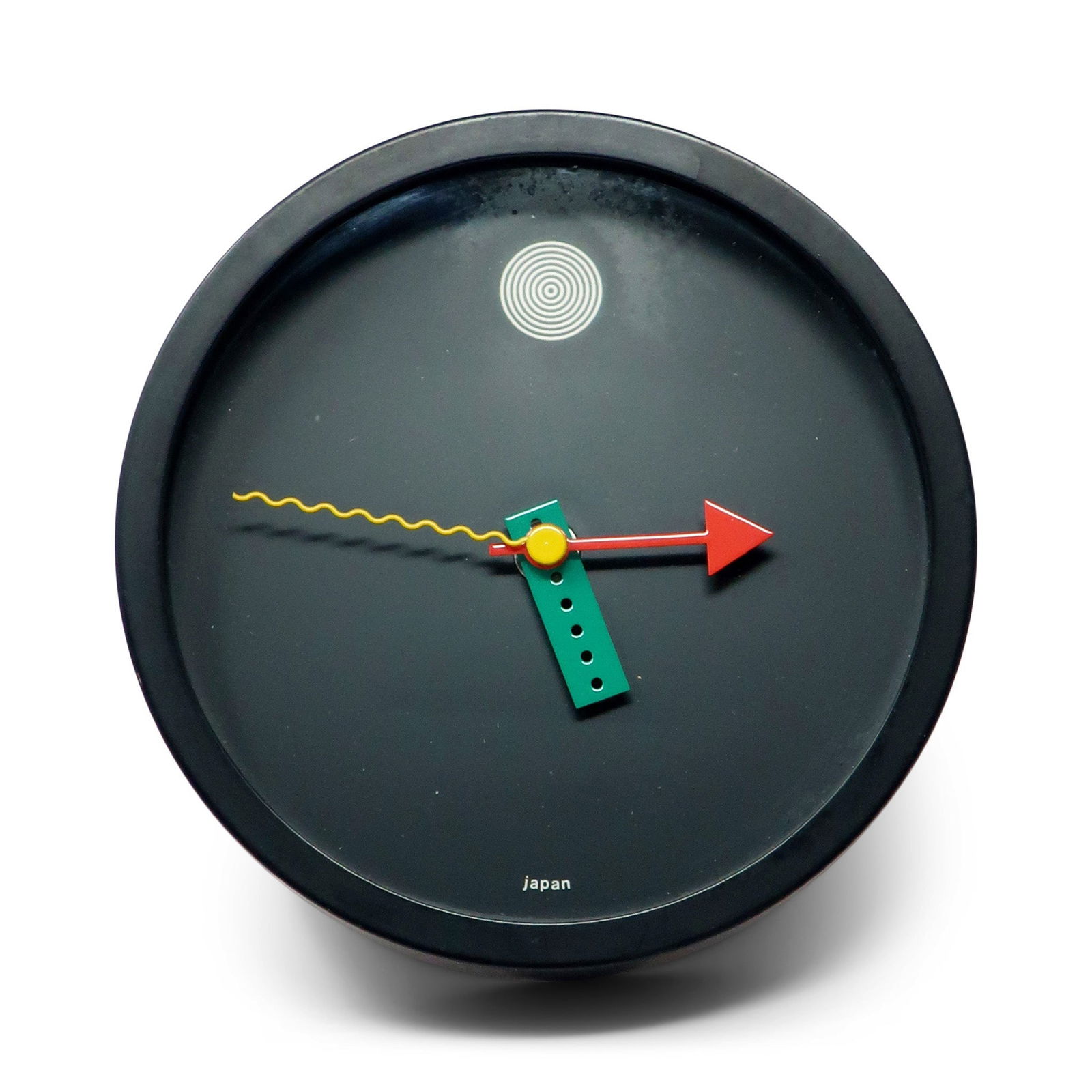 1980s Postmodern Wall Clock by Shohei Mihara for Wakita: A perfectly elegant and sophisticated 1980s wall clock designed by Shohei Mihara for Wakita. Postmodern, Memphis Group-influenced design at its finest! Black with white, red, green, and yellow accents