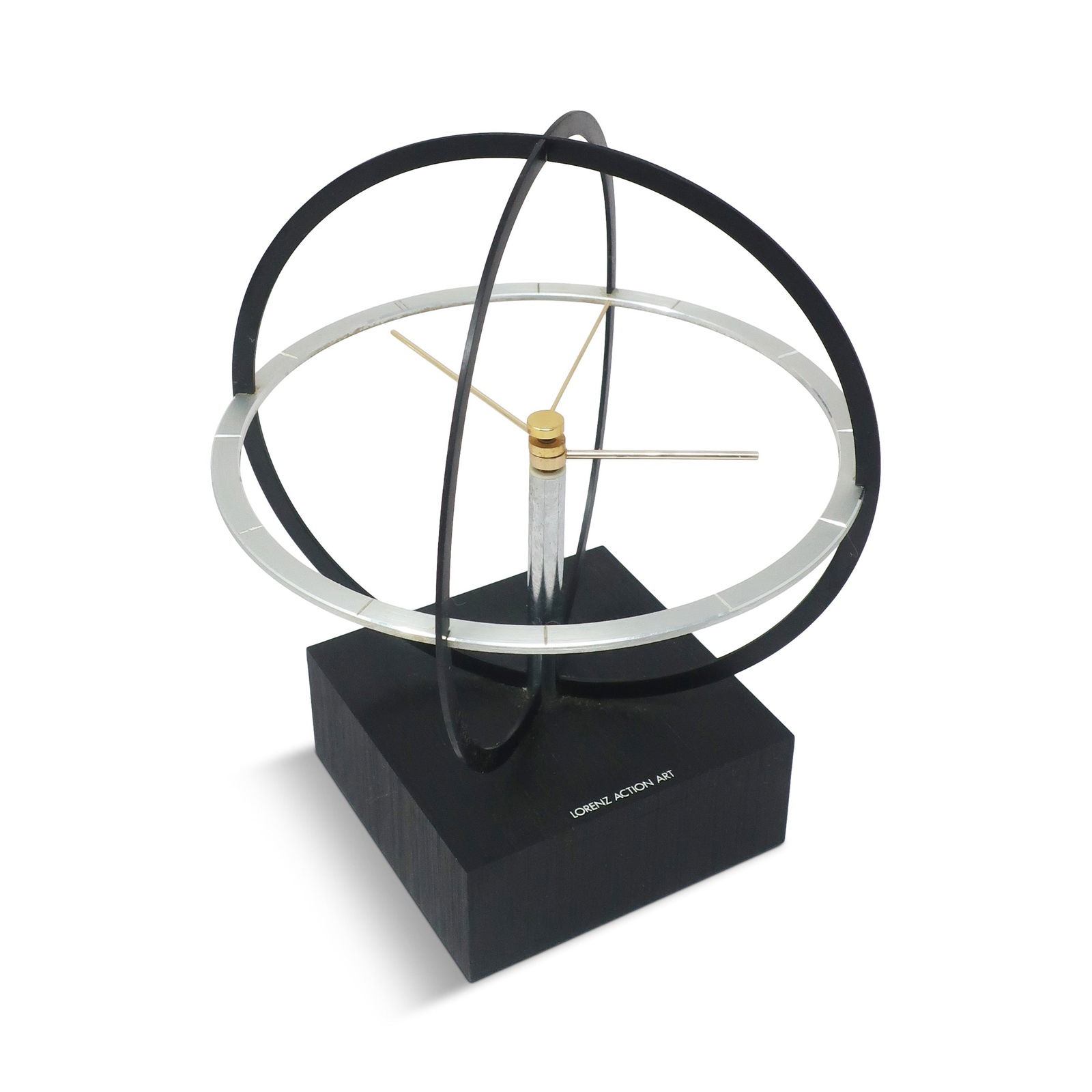 Vintage 1980s Lorenz Action Art Table/Wall Clock: Bringing a touch of Space Age design flair to your space, this mid-century clock features a kinetic sphere design, with the clock's hands rotating within the chrome frame. Cleverly designed so that it