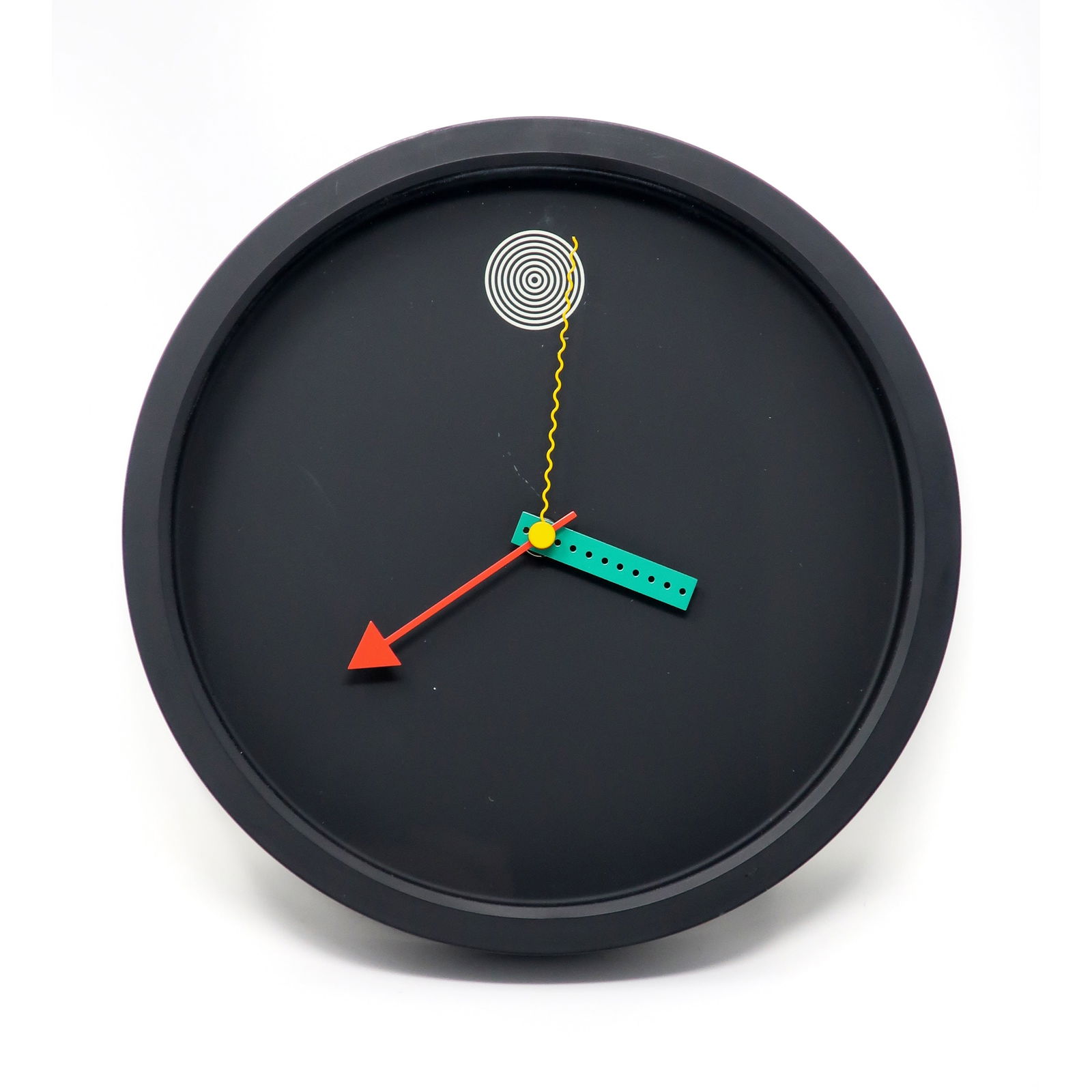 1980s Postmodern Wall Clock by Shohei Mihara for Wakita: A perfectly elegant and sophisticated 1980s wall clock designed by Shohei Mihara for Wakita. Postmodern, Memphis-influenced design at its finest! Black with white, red, green, and yellow accents. Batt