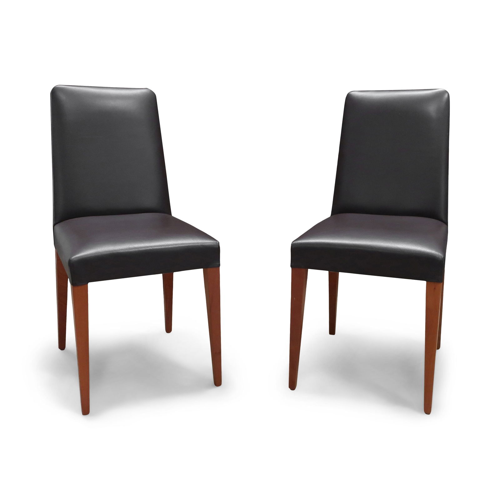 Pair of Brown Leather "Classic Chair" by Roberto Lazzeroni for Ceccotti Collezioni: As its name itself suggests, this pair of chairs are one of Ceccotti Collezioni's timeless classics. Designed by the company's celebrated artistic director Roberto Lazzeroni in 2001, the "Classic" has
