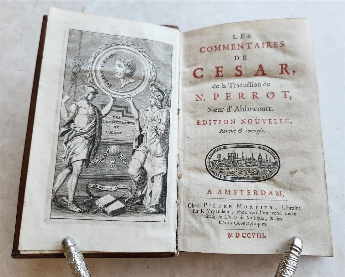 1708 JULIS CAESAR COMMENTARIES antique: Les Commentaires de CESAR de la traduction de N. Perrot. Edition nouvelle. Amsterdam, Mortier; 1708 With engraved front and 1 folded copper plate. 17 leaves, LX, 444 pages, 18 leaves. Size 4 by 6.5" O