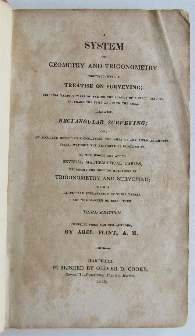 1813 SYSTEM of GEOMETRY & TRIGONOMETRY SURVEYING AMERICANA antique ILLUSTRATED: Leather bound. Size 5 1/4 by 8 3/4" Hartford, 1813 Illustrated with traverse tables and fold out plates (not complete, some plates are missing) Wear, toning, foxing, archival tape repairs on the backs