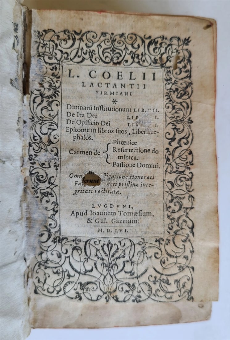 1556 Divinarum institutionum by LACTANTIUS antique VELLUM BOUND: Lactantius, Lucius Coclius Firmianus Divinaru(m) Institutionum Lib VII. De Ira Dei Liber I. De Opificio Dei Liber I. Epitome in libros suos, Liber acephalos. Carmen de Phoenice / Resurrectione dominic