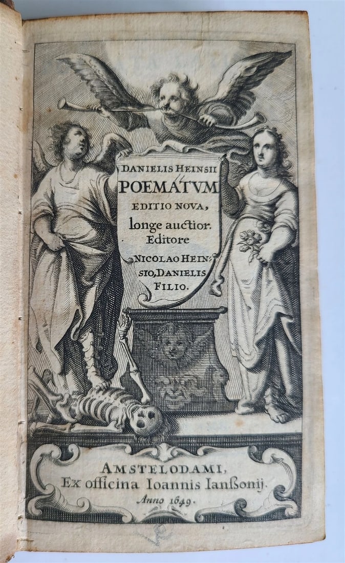 1649 POETRY LATIN & GREEK by Daniel Heinsius antique Poemata Latina et Graeca: Poemata Latina et Graeca by Daniel Heinsius. Amsterdam, 1649 Size 3 by 5" With additional engraved title and errata leaf at rear. Bound in early full calf, intact, spine with chips, contents clean A n