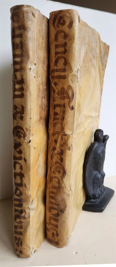 1676 pair of LAW FOLIO BOOKS antique VELLUM BINDING w/ MANUSCRIPT SPINES: D.ALPHONSI de GUZMAN TRACTATUS DE EVICTIONIBUS and TRACTATUS LUD. CENCII IURISCONSULTI PERUSINI de CENSIBUS Ligduni; 1676 Original limp vellum with manuscript title to the spine Some toning, occasiona