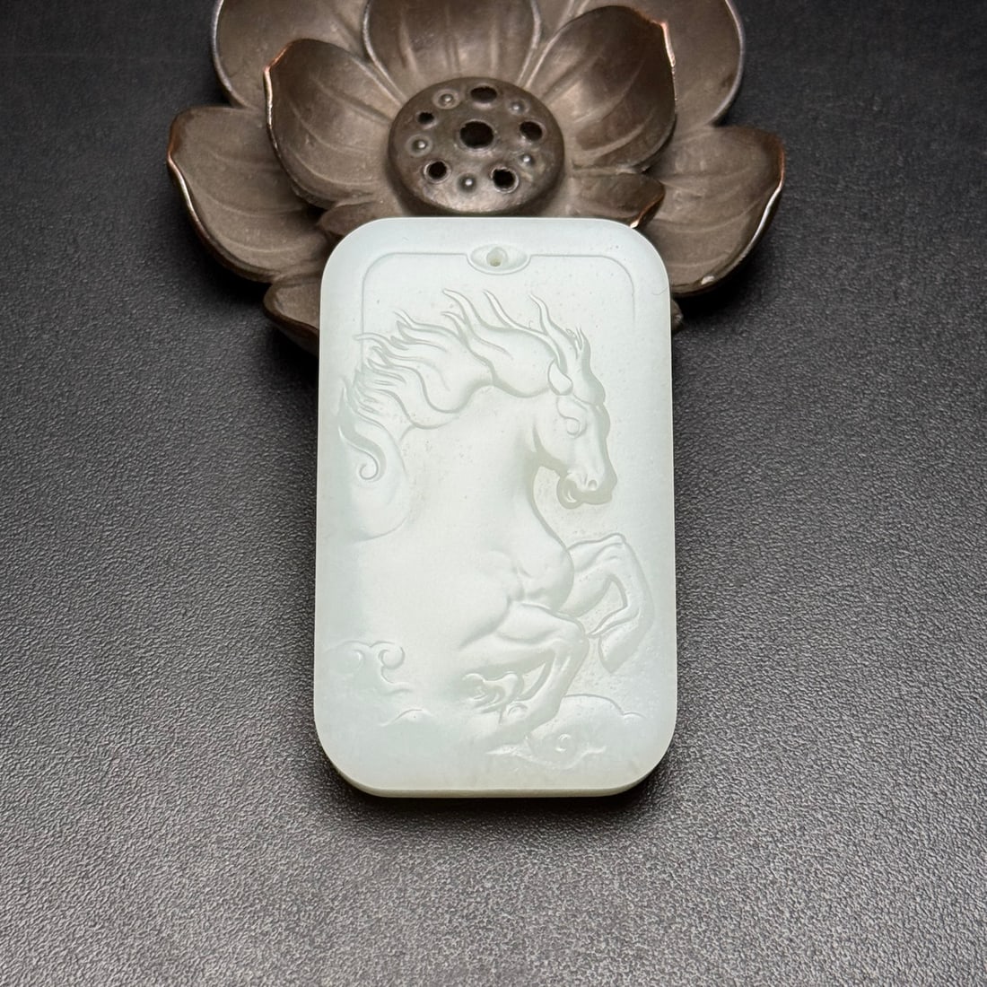 Chinese Hetian Jade Horse Pendant: Title: Chinese Hetian Jade Horse Pendant Date/Period: After2025 Origin: Chinese Dimension: 54x32x10(mm) 2.13x1.26x0.39(inches) Weight 0.09 lbs/41g Materials: Hetian Jade Reserve: $399.00 Shipping:
