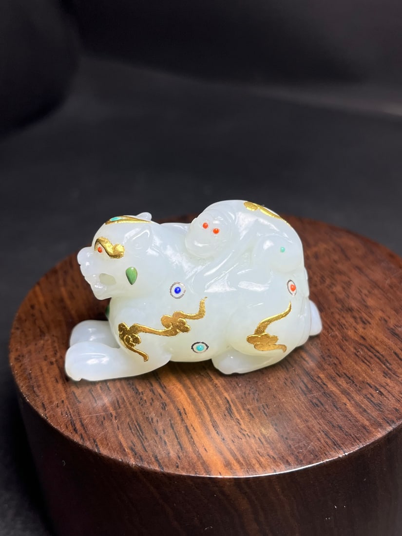 Chinese Gilt Gold Hetian Jade Carved Fortune Beast Statue: Title: Chinese Gilt Gold Hetian Jade Carved Fortune Beast Statue Date/Period: After2000 Origin: Chinese Dimension: 50 x 30 x 23 (mm)1.97 x 1.18 x 0.90 (inches) Weight: 0.10 lbs/ 46 g Materials: Gilt G