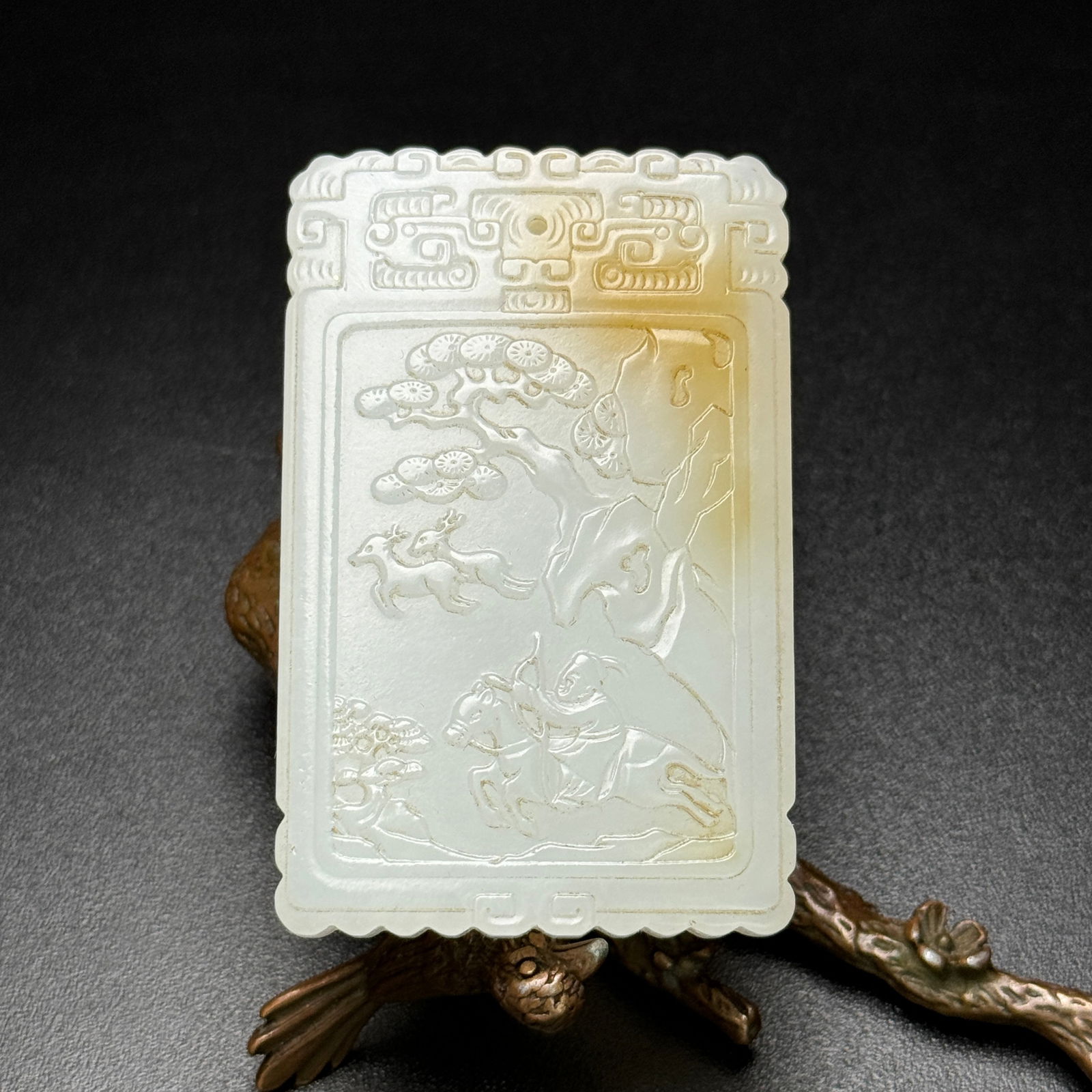 Chinese Natural Hetian Jade Low Relief Pine Tree & Figure Pendant: Title: Chinese Natural Hetian Jade Low Relief Pine Tree & Figure Pendant Date/Period: After2000 Origin: Chinese Dimension: 65 x 42 x 8 (mm)2.56 x 1.65 x 0.31 (inches) Weight:0.12 lbs/ 54 g Materials: