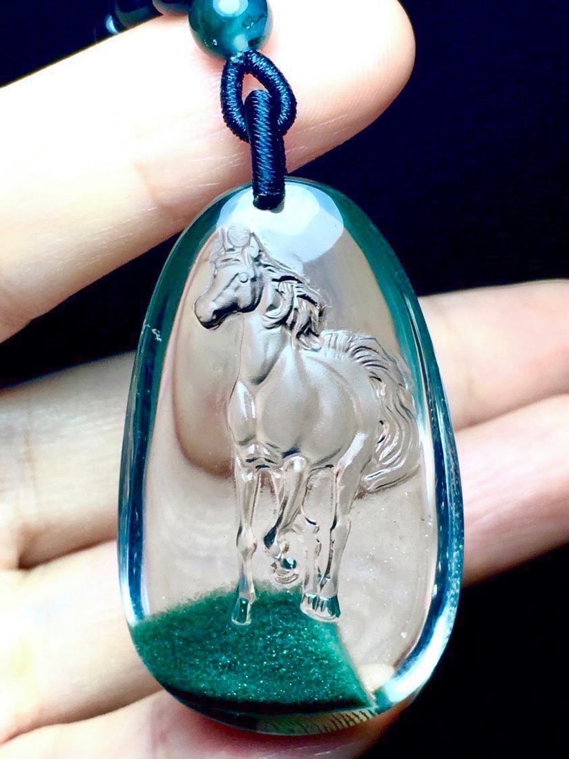 Beautiful Natural Green Crystal Carved Fortune Horse Pendant: Title: Beautiful Natural Green Crystal Carved Fortune Horse Pendant Date/Period: After2020 Origin: Chinese Dimension: 44 x 27 x 14 (mm) 1.73 x 1.06 x 0.55 (inches)Weight 0.05 lbs/ 21 g Materials: Crys