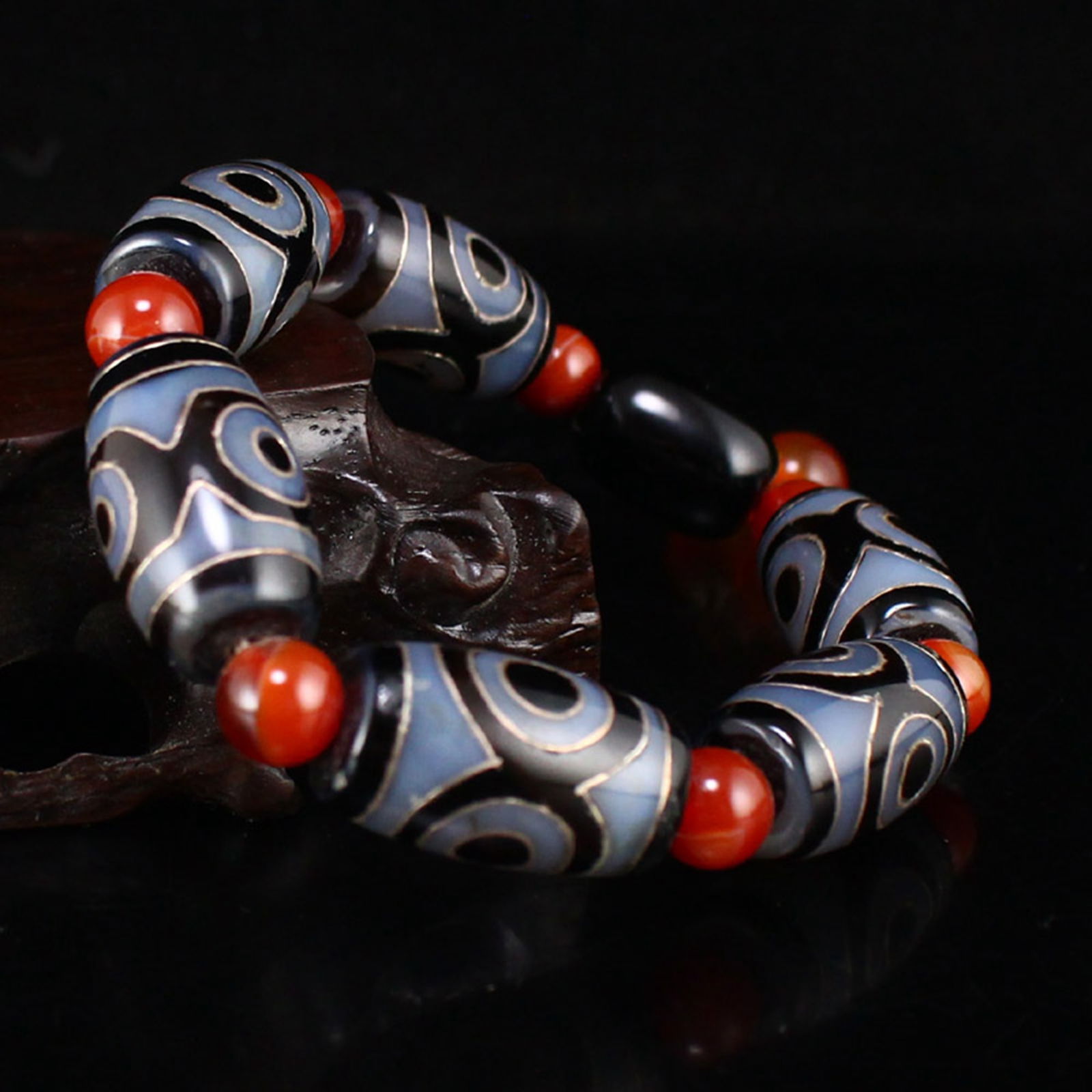 Tibetan DZI Agate Inlay Silver Wire Prayer Bracelet: Title: Tibetan DZI Agate Inlay Silver Wire Prayer Bracelet Date/Period: After1900 Origin: Chinese Dimension: 24 x 14 x 14(mm) 0.94 x 0.55 x 0.55(inches) Weight 0.13 lbs/60 g Materials: DZI Agate?Silve