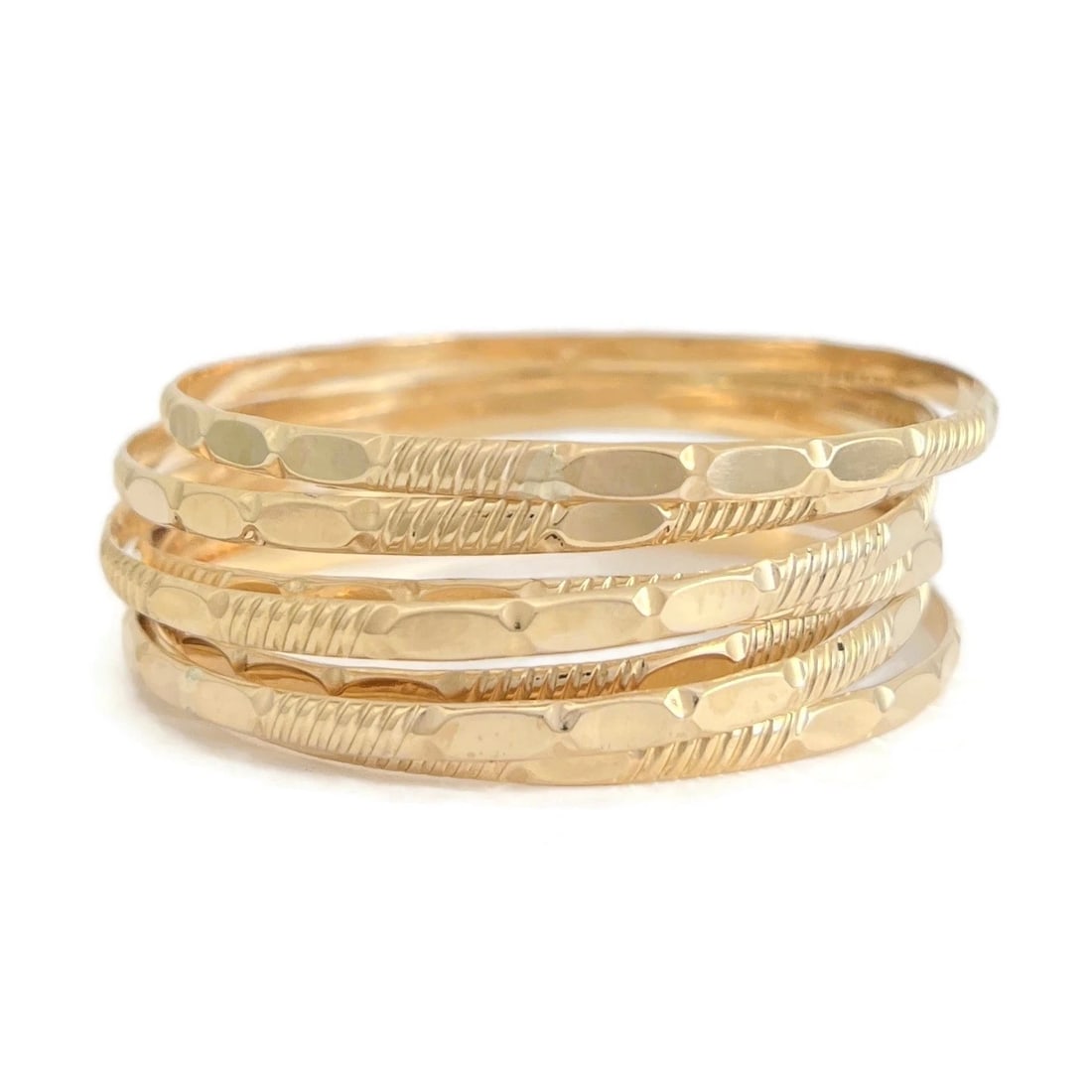Vintage Set of 7 Stackable Bangle Bracelets 14K Yellow Gold, 38.96 Grams: Title: Vintage Set of 7 Stackable Bangle Bracelets 14K Yellow Gold, 38.96 Grams Description: Vintage Set of 7 Stackable Bangle Bracelets 14K Yellow Gold, 38.96 Grams This is such a unique bracelet! Pl