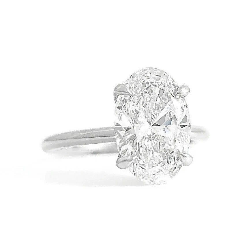 Oval Lab-Created Diamond Solitaire Engagement Ring 14K White Gold, 2.70 CT: Title: Oval Lab-Created Diamond Solitaire Engagement Ring 14K White Gold, 2.70 CT Description: Oval Lab-Created Diamond Solitaire Engagement Ring 14K White Gold, 2.70 CT This is a beautiful diamond en