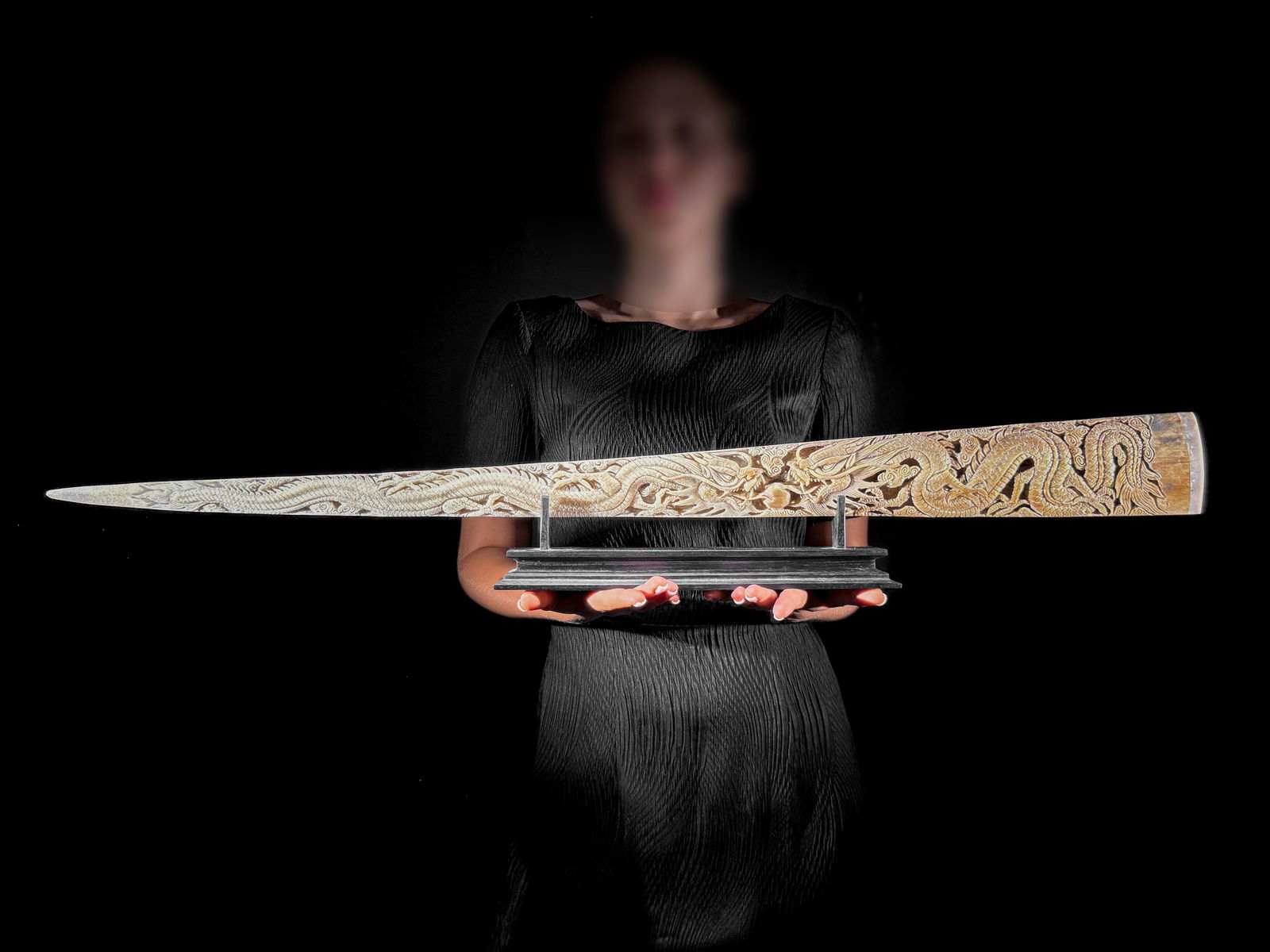 An extra large carved swordfish - Double Dragon motif: Title: An extra large carved swordfish - Double Dragon motif Maker:Unknown Origin: Indonesia Date/Period:2025 Materials:Xiphius Gladius, Bone, Wood Dimensions:Length: 92 cm / 36.2 inches Description:A