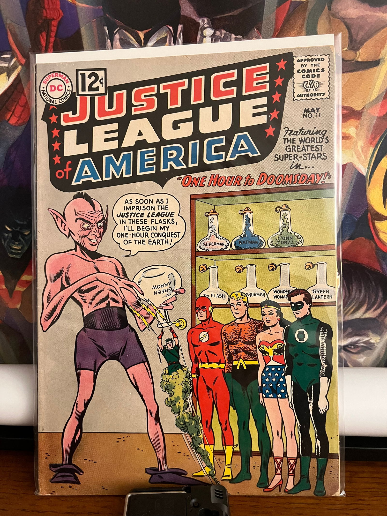 JLofA #11: Title: JLofA #11 Description: Flash, Aquaman, Wonder Woman Green Lantern Date/Period: 1962 Materials: DC Comics Reserve: $125.00 Shipping: Domestic: Shipping rates are determined by destination Intern