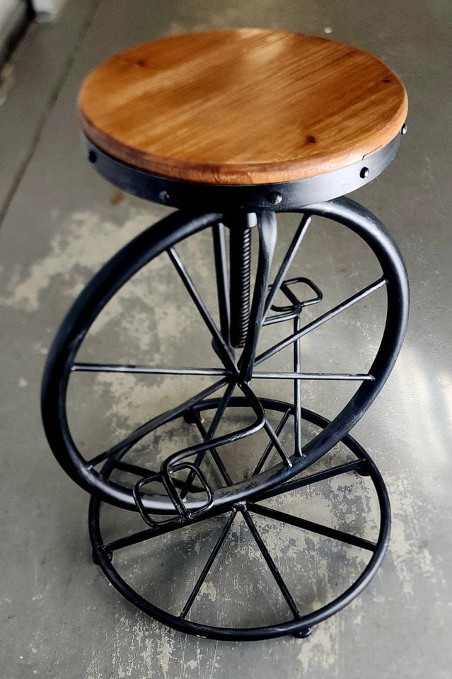 Fantastic vintage handmade iron unicycle style bar stool w/ wooden seat. Perfect for kitchen or den.: Fantastic vintage handmade iron unicycle style bar stool w/ wooden seat. Perfect for kitchen or den. Reserve: $250.00 Shipping: Domestic: Shipping rates are determined by destination Interna