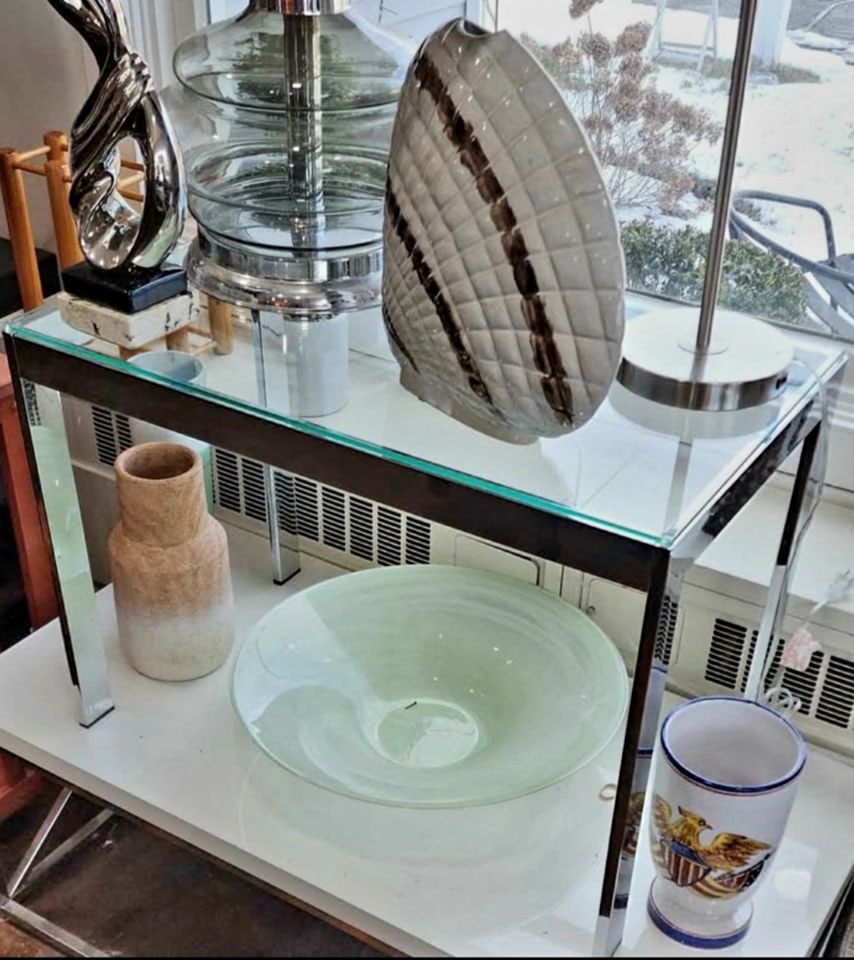 After Milo Baughman Mid-century Vintage steel and glass side table: After Milo Baughman Mid-century Vintage steel and glass side table Reserve: $500.00 Shipping: Domestic: Shipping rates are determined by destination International: Foreign shipping rates are