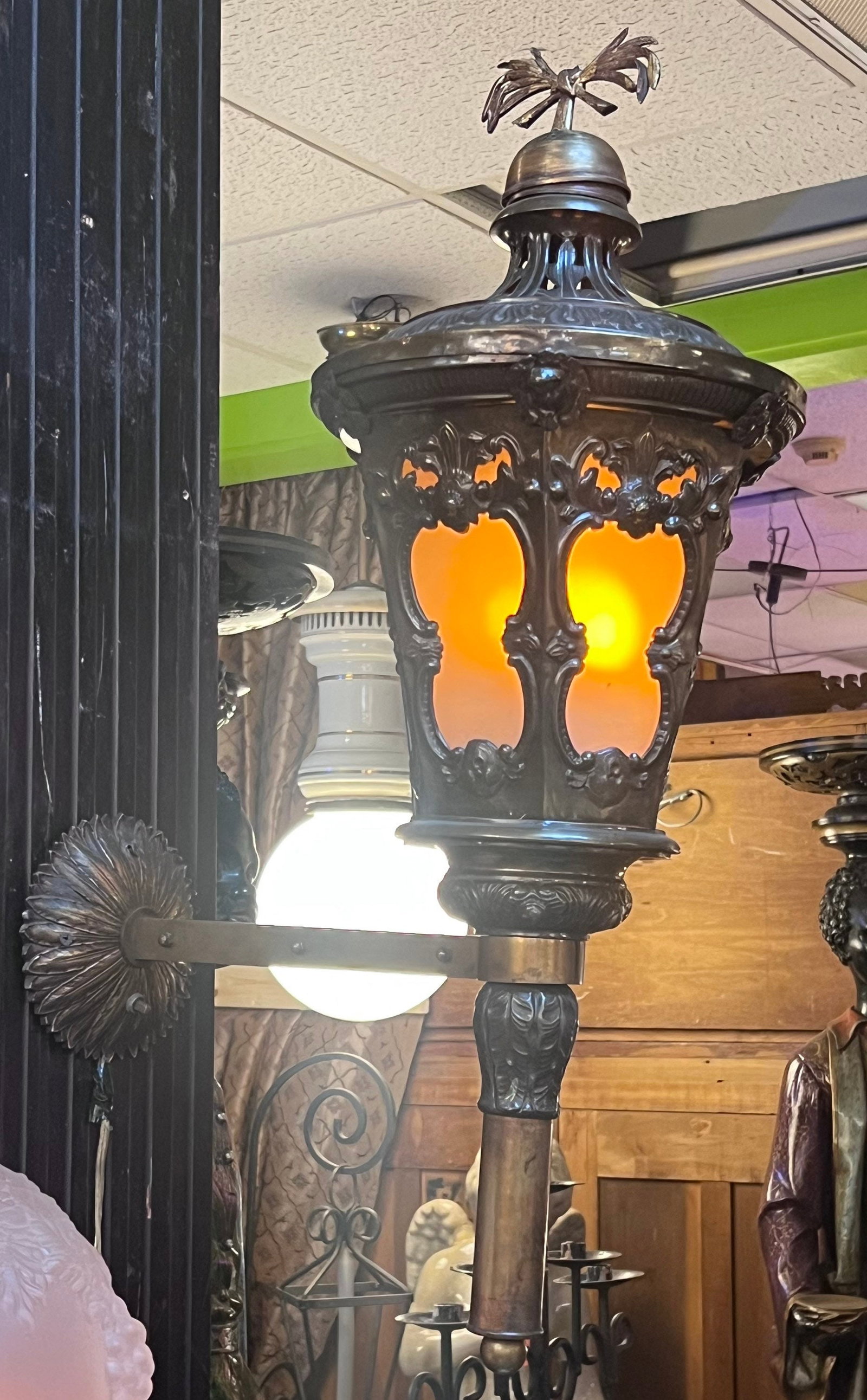 Antique Wall Mounted Brass Electrified Indoor/Outdoor Lantern: Title: Antique Wall Mounted Brass Electrified Indoor/Outdoor Lantern Description: Vintage from the 1920s Materials: Glass, metal Width: 12 inches Height: 30 inches Depth: 18 inches Antique Wall