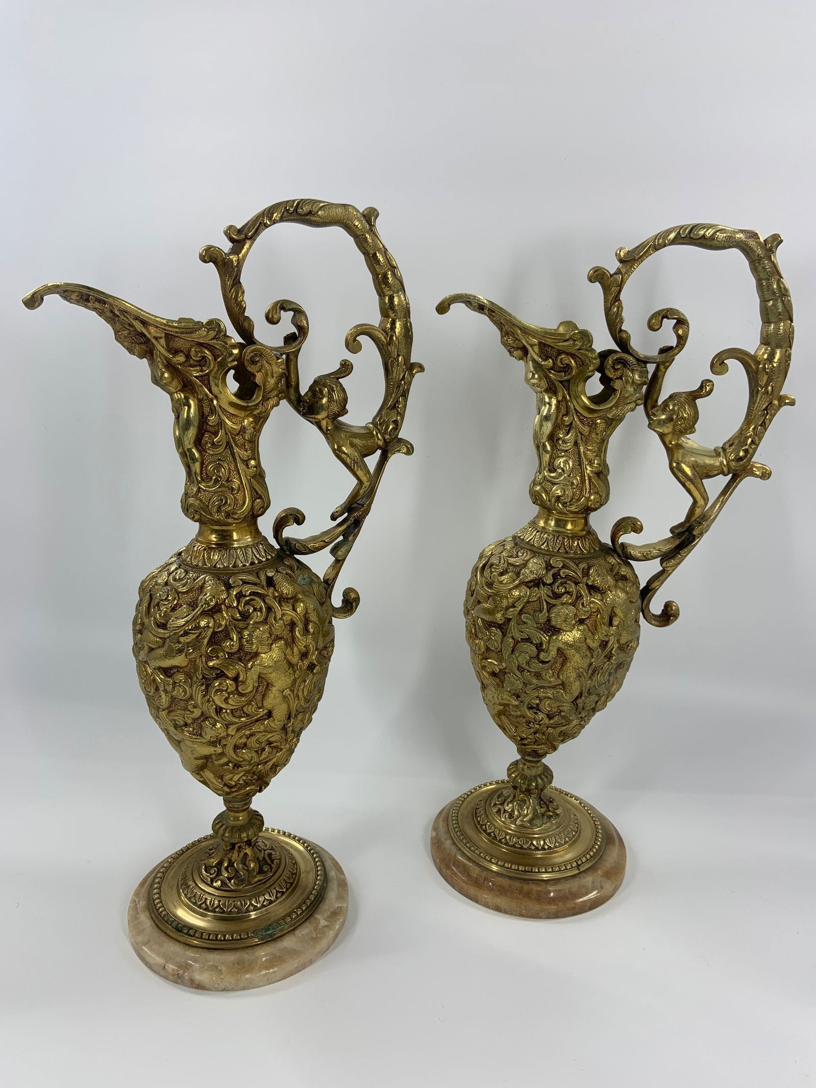 Antique French Renaissance Revival Figural Ormolu Ewers - Pair: Title: Antique French Renaissance Revival Figural Ormolu Ewers - Pair Description: Vintage from the 19th century Materials: bronze, metal Antique French Renaissance Revival Figural Ormolu Ewers -