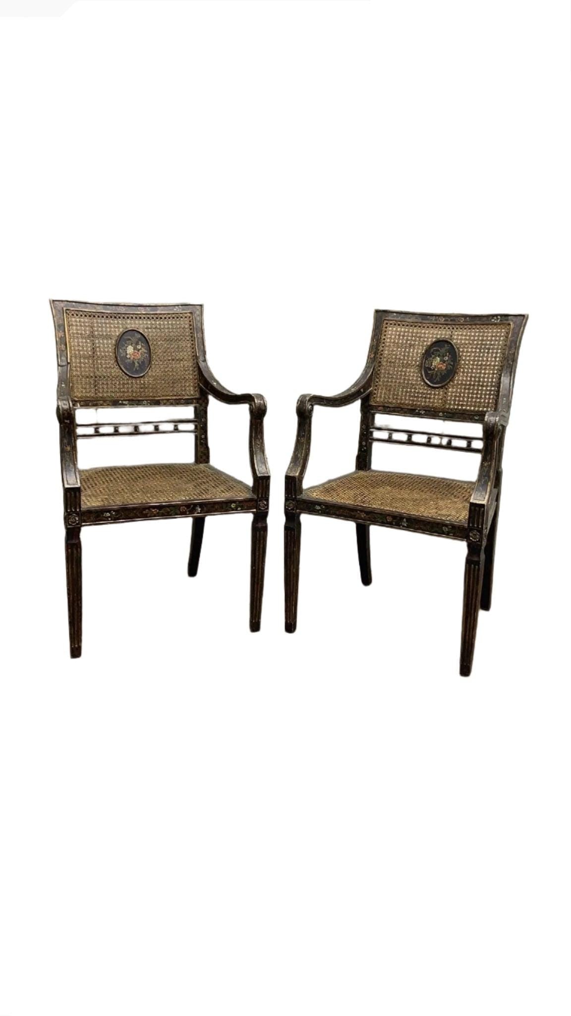 Antique English Regency Hand Painted Cane Back Medallion Chairs - Pair: Title: Antique English Regency Hand Painted Cane Back Medallion Chairs - Pair Description: Antique English Regency Hand-Painted Cane-Back Medallion Armchairs- Pair These antique caned chairs showcase