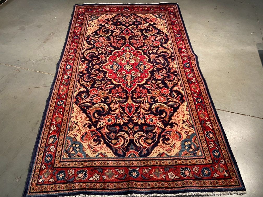 MAGNIFICENT PERSIAN SAROUK RUG 4.4x7.8: Title:MAGNIFICENT PERSIAN SAROUK RUG 4.4x7.8 Description:4'.4"X7'.8" Authentic Persian Sarouk Rug in Navy Blue and multi accent colors 100% wool Hand knotted in Iran Reserve: $580.00 Shipping: Domesti