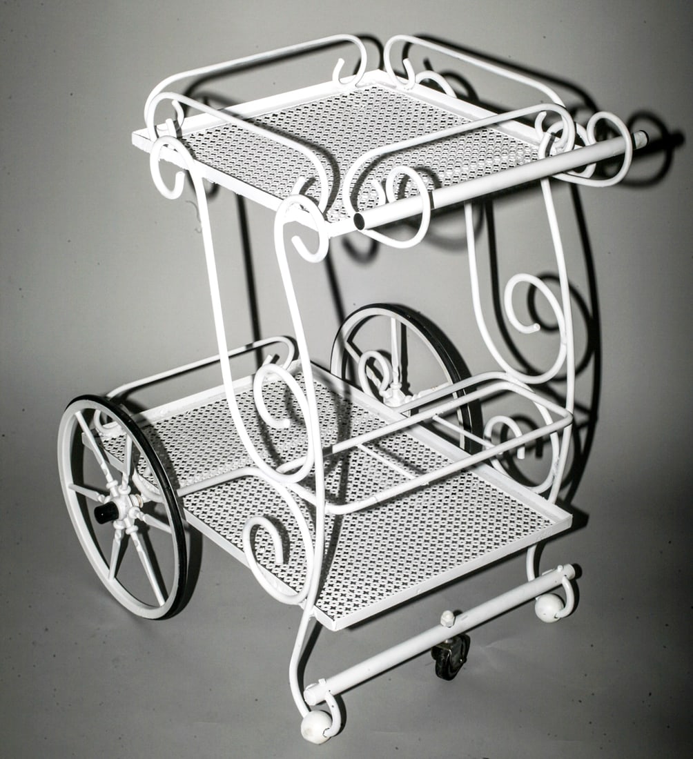 FRENCH-MODERNIST-TROLLEY-MATEGOT Mid-century serving table rigitulle 2: Title: FRENCH-MODERNIST-TROLLEY-MATEGOT Mid-century serving table rigitulle 2 Description: French modernist bottle holder made in the 1950's by Mathieu Mategot , it is made with his trademark bent met