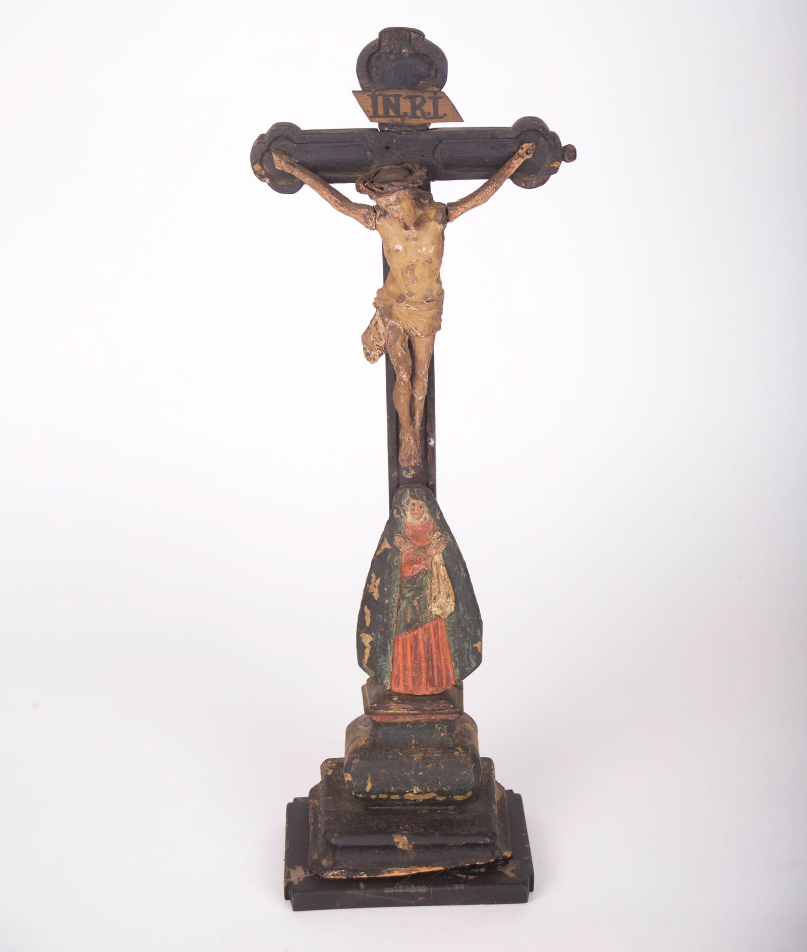 French early 18th Century Carved And Painted Wooden Crucifix: Title: French early 18th Century Carved And Painted Wooden Crucifix Description: An early 18th Century antique hand carved and polychromed hand painted table crucifix from France with its original