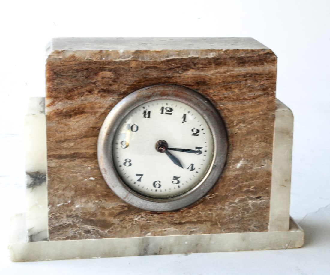 French art deco marble desk clock: Title: French art deco marble desk clock Description: French art deco desk clock with marble body , seems to work but will need revision , mechanic with rewiring key. H.4 x L.6 Clock face 2.1/2 