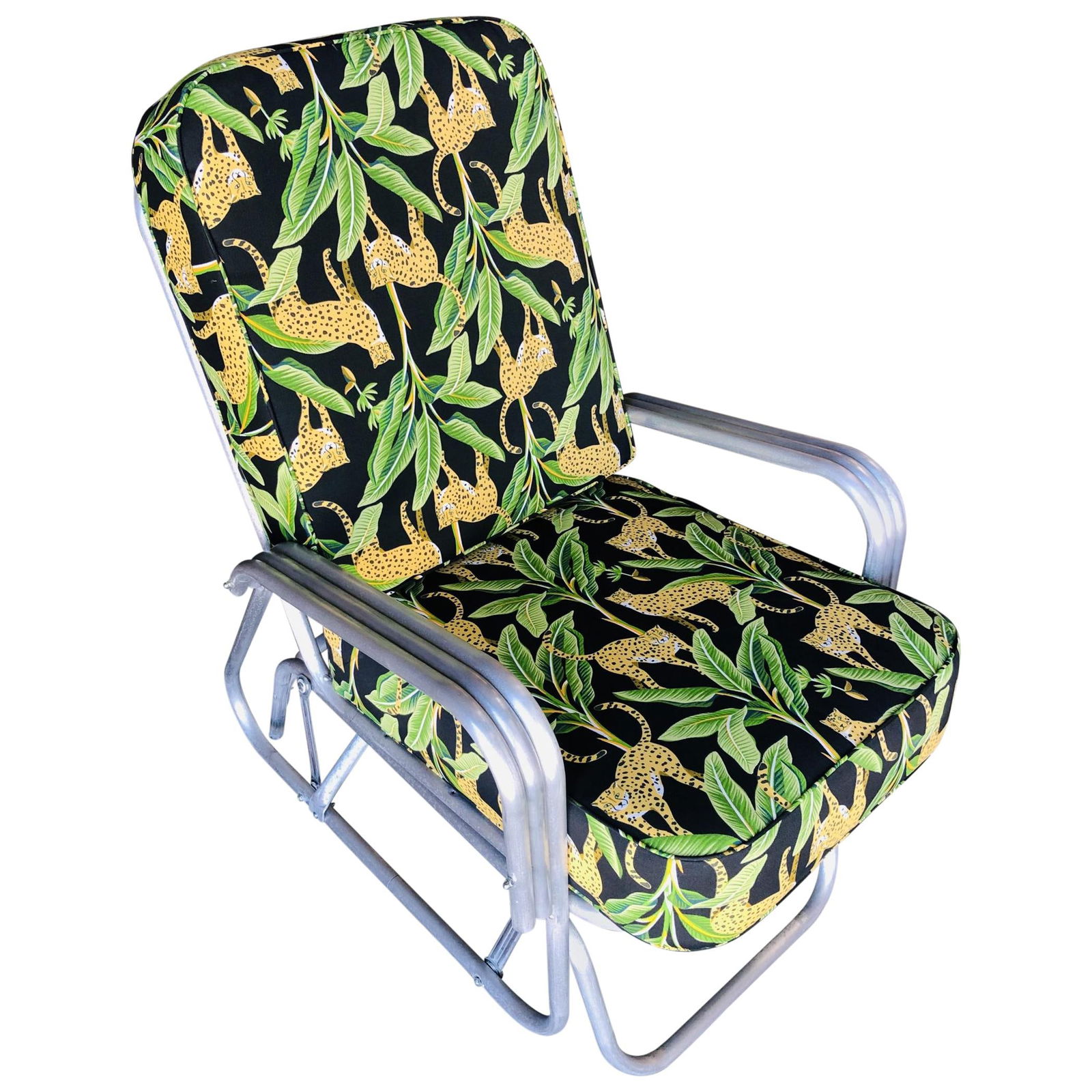 Aluminum Patio/Outdoor Slider Rocking Lounge Chair with Speed Arm: Title: Aluminum Patio/Outdoor Slider Rocking Lounge Chair with Speed Arm Description: Midcentury patio/outdoor lounge chair consisting of an aluminum frame with decorative scrolling things. Cushions