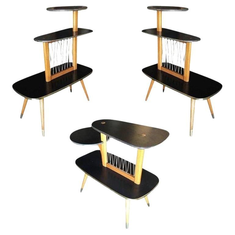 1950s Three-Tier Midcentury String Art Center Side Tables, Set of 3: Title: 1950s Three-Tier Midcentury String Art Center Side Tables, Set of 3 Description: Set of three midcentury side tables with string art center design featuring black Formica tops with brass trim