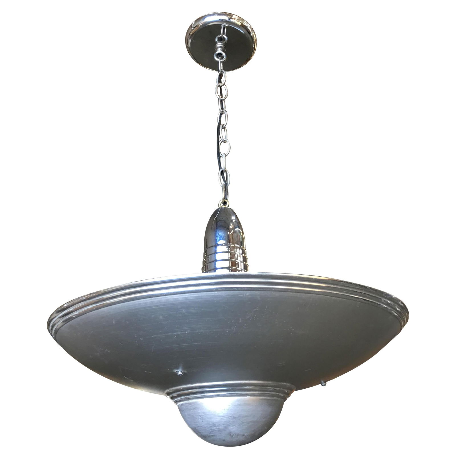 Aluminum Art Deco Saucer Ceiling Pendant Lamp: Title: Aluminum Art Deco Saucer Ceiling Pendant Lamp Description: Vintage 1930s aluminum Art Deco saucer-shaped hanging ceiling pendant lamp. Available 2. Reserve: $720.00 Shipping: Domestic: Shipping