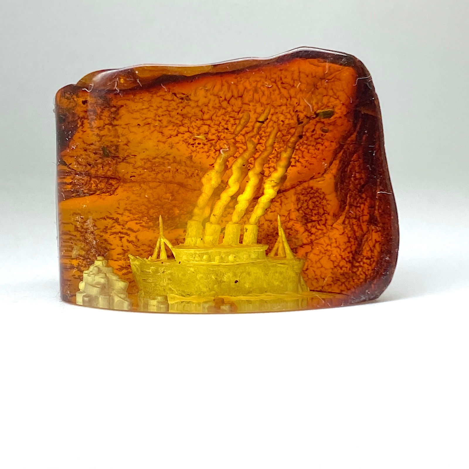 Masterpiece Hand Carving in Natural Amber stone: Title:Masterpiece Hand Carving in Natural Amber stone Metal:None Gemstone:Amber Weight:5.15 g Size:Size: 30.0 x 22.0 x 18.0 mm Size: 1.181 x 0.866 x 0.709 inches Made of:(Reconstituted Amber or Whole