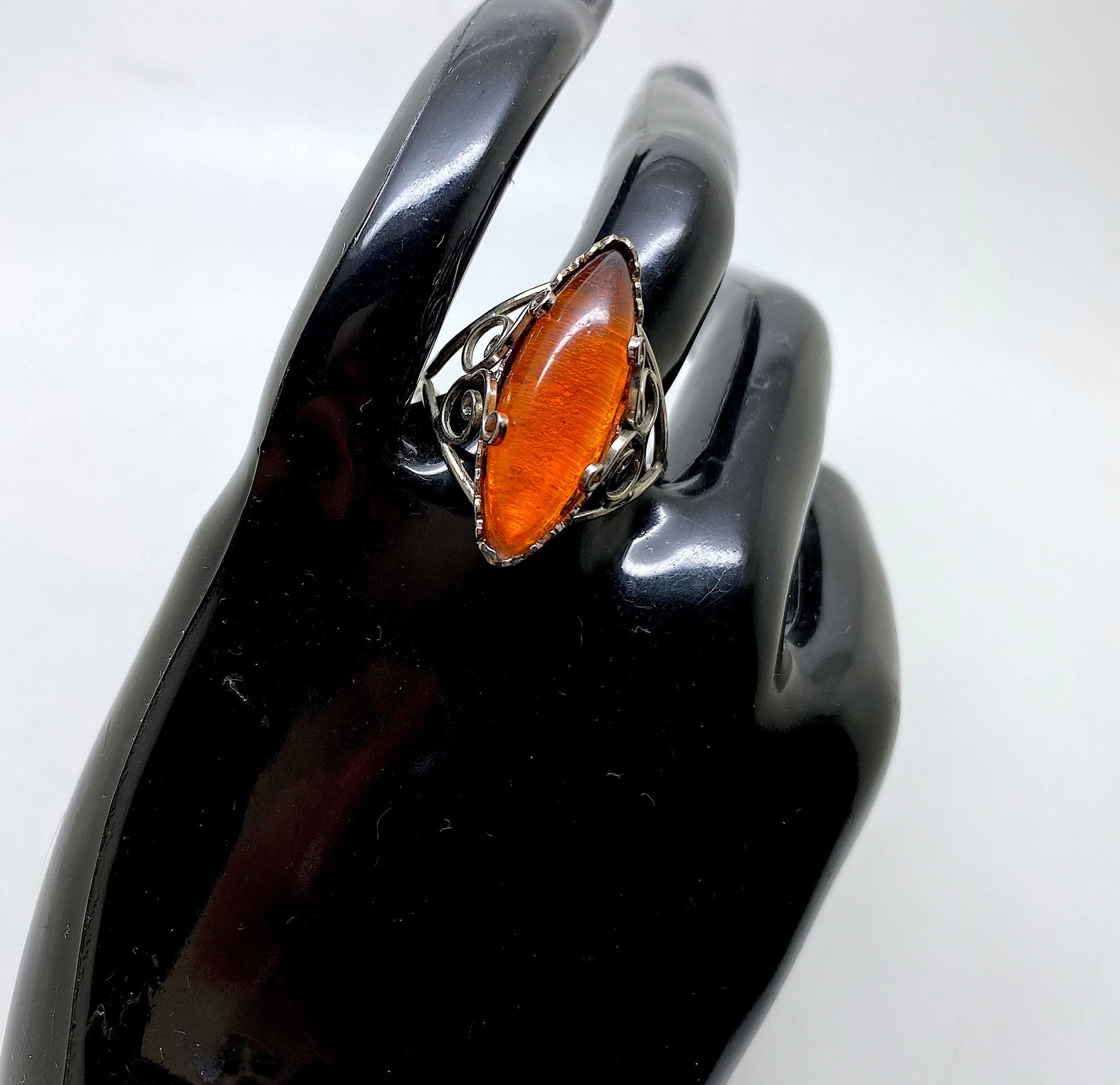 Fascinating Unique Vintage Amber Ring: Title:Fascinating Unique Vintage Amber Ring Metal:None Gemstone:Amber Weight:3.4 g Size:Inner diameter: 19.0 mm Size: 26.0 x 22.0 x 29.0 mm Size: 1.024 x 0.866 x 1.142 inches Inner diameter: 0.748 inc