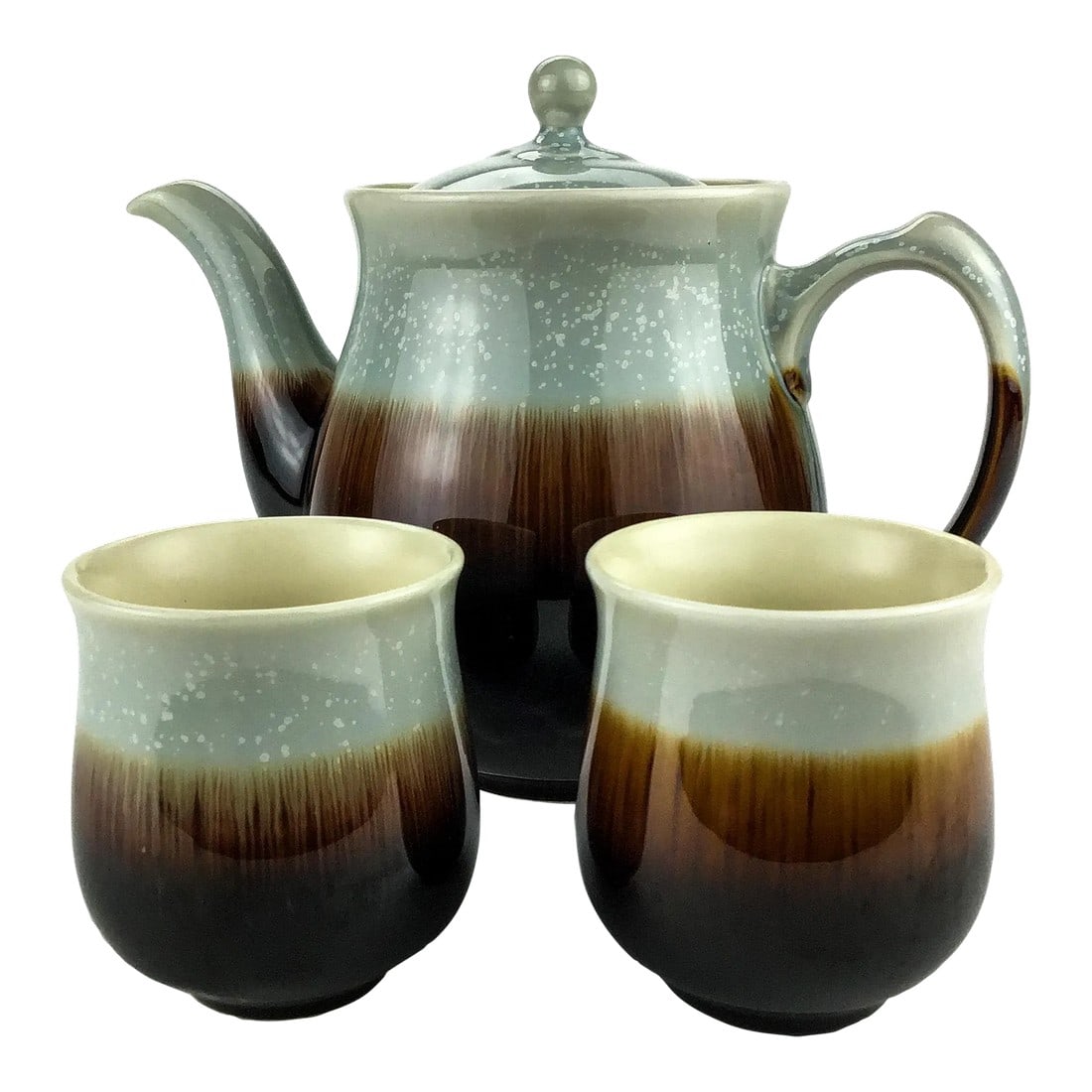 Artisan Created Porcelain Tea Set Signed: Gorgeous unique glazing design has been perfectly executed on this set of porcelains. The teapot has a built in filter for keeping the tea leaves out of your cup. The cups are a generous size and
