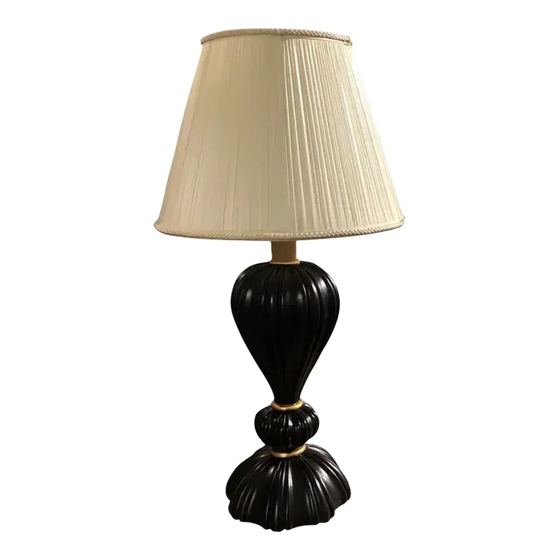 1990s Italian Hand Carved Florentine Style Lamp With Shade: Hand carved Florentine style lamp featuring an ebony painted finish with gold gilt accents includes a soft dove gray satin shade. Italy. Condition: Alterations: Original Condition Unaltered