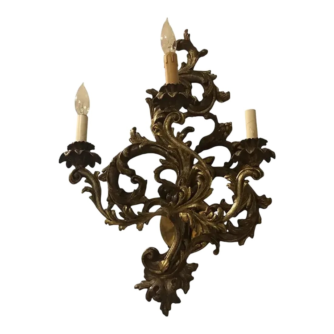 1990s Hand-Carved Wood Sconce Featuring Three Lights: Hand-carved wood sconce featuring three lights with an antiqued silver gilt and mecca finish. Created in Italy. Condition: Alterations: Original Condition Unaltered Imperfections: Some
