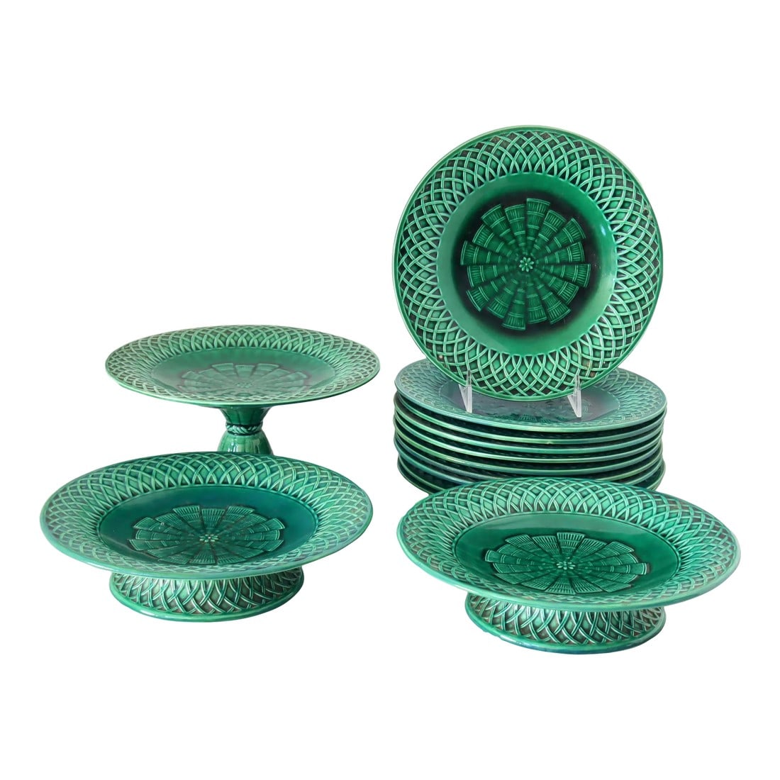 1860s Christopher Dresser Mintons Majolica Dessert Set: A rare and highly collectible Mintons Majolica dessert service designed in 1867 by Dr. Christopher Dresser"”one of the most influential British designers of the 19th century. Glazed in Mintons'