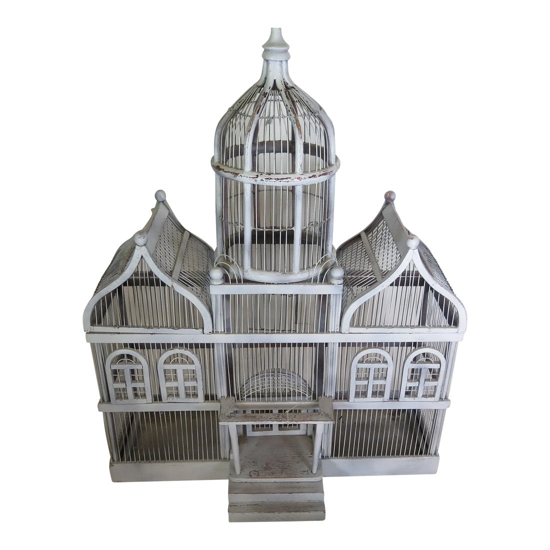 Large French Antique Wooden and Wire Off White Patina Sculptural Bird Cage: This French birdcage is a 19th Century hand constructed bird cage made from African Acacia wood and strong metal wiring that is the sculptural support that holds the rest of the Acacia frame of