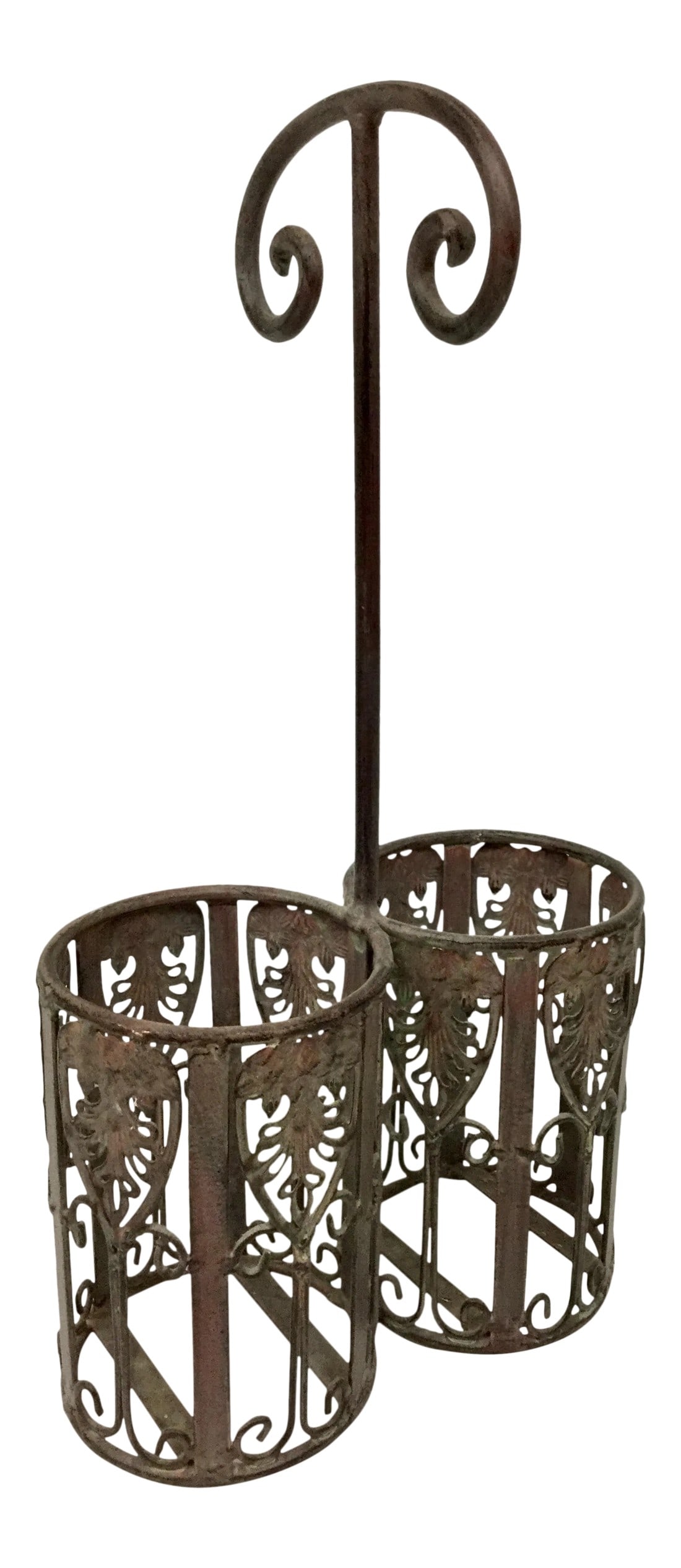 Vintage Metal Bottle Holder: A beautiful heavily carved metal bottle holder. I like call it a wine bottle holder just because wine bottles look cool in this piece. Condition: Alterations: Original Condition Unaltered