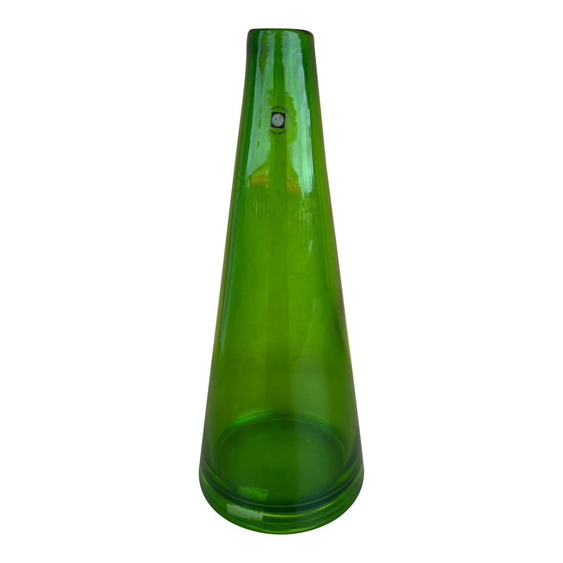 Mid Century Green Art / Vase Glass by Tarnowiec: Handmade green glass art by Tarnowiec. Tall being 14" the base is 5.5" in diameter and the top is about 1". There is a sticker on this glass labeling it as Tarnowiec from Poland. Condition: