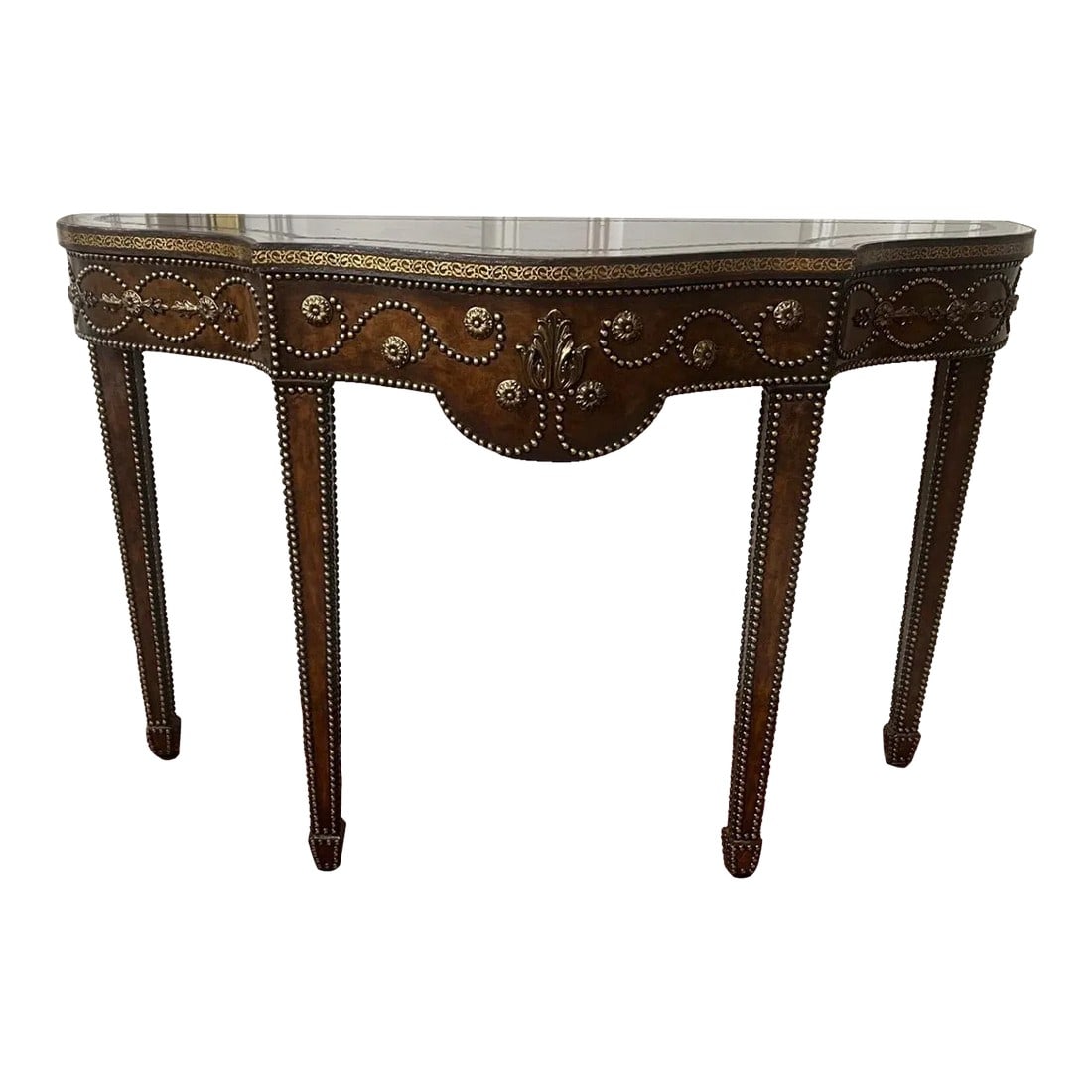 Maitland-Smith Tooled Leather Console Table: NOTE: Delivery: Occasional delivery is available throughout the East Coast at competitive rates. Please inquire for availability and a quote. A Maitland-Smith console table from the late 20th