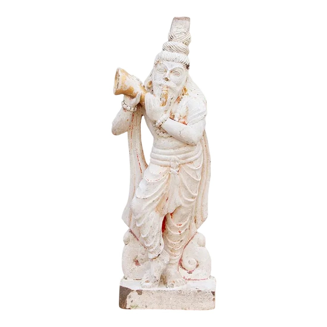 Antique Carved Stone Sadhu Statue: An antique finely carved statue from southern India that was originally part of an exterior wall of a temple. This antique statue is hand-carved out of stone, which is a common material used in